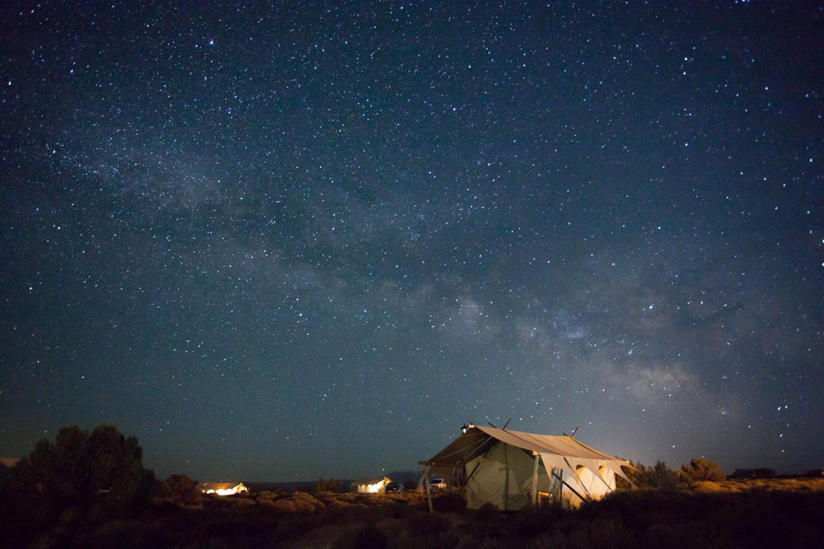 a 4 person canvas tent under the stars