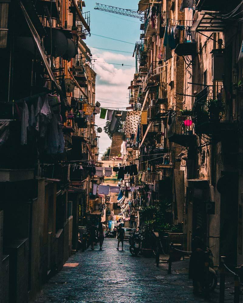 a narrow street in napoli italy