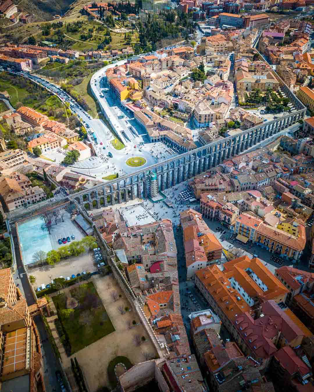 seeing the roman aqueduct de segovia from above after taking the madrid segovia bus