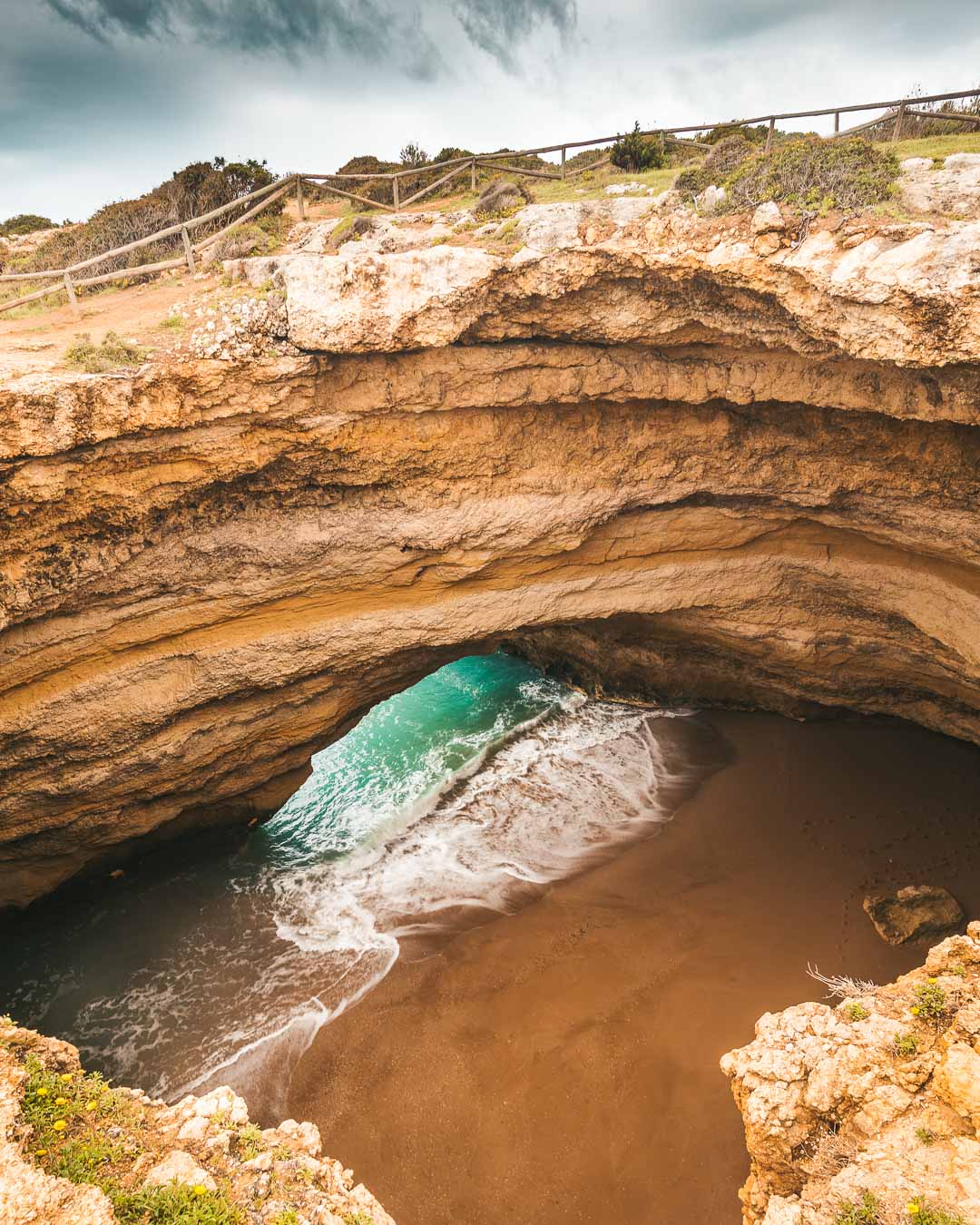 benagil cave from the cliffs