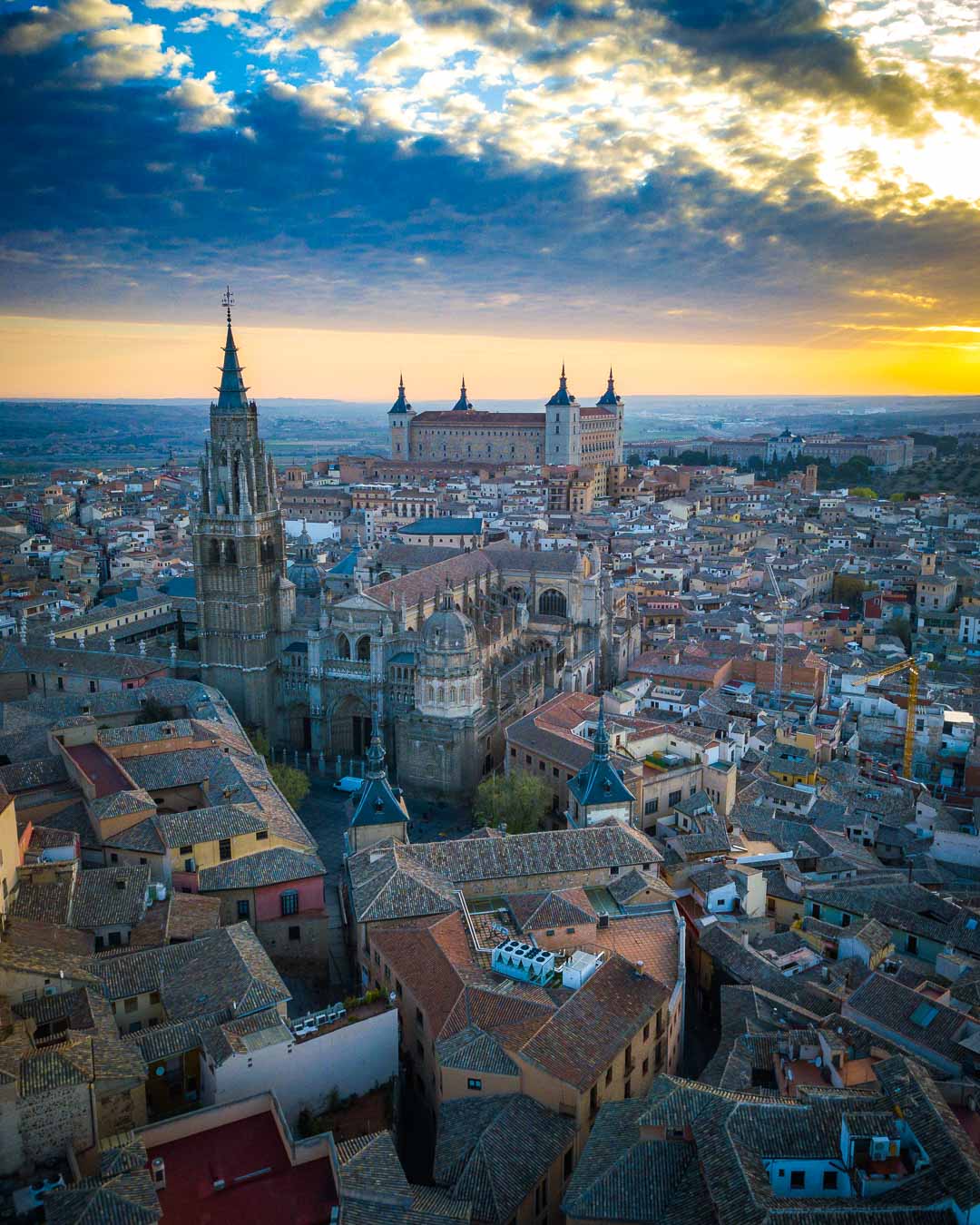 toledo cathedral and alcazar under the sunrise