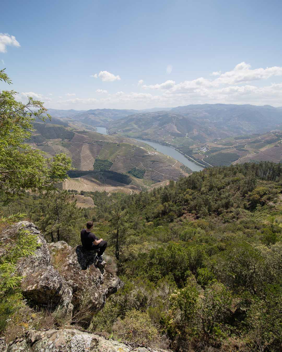 sitting on a rock over the douro valley