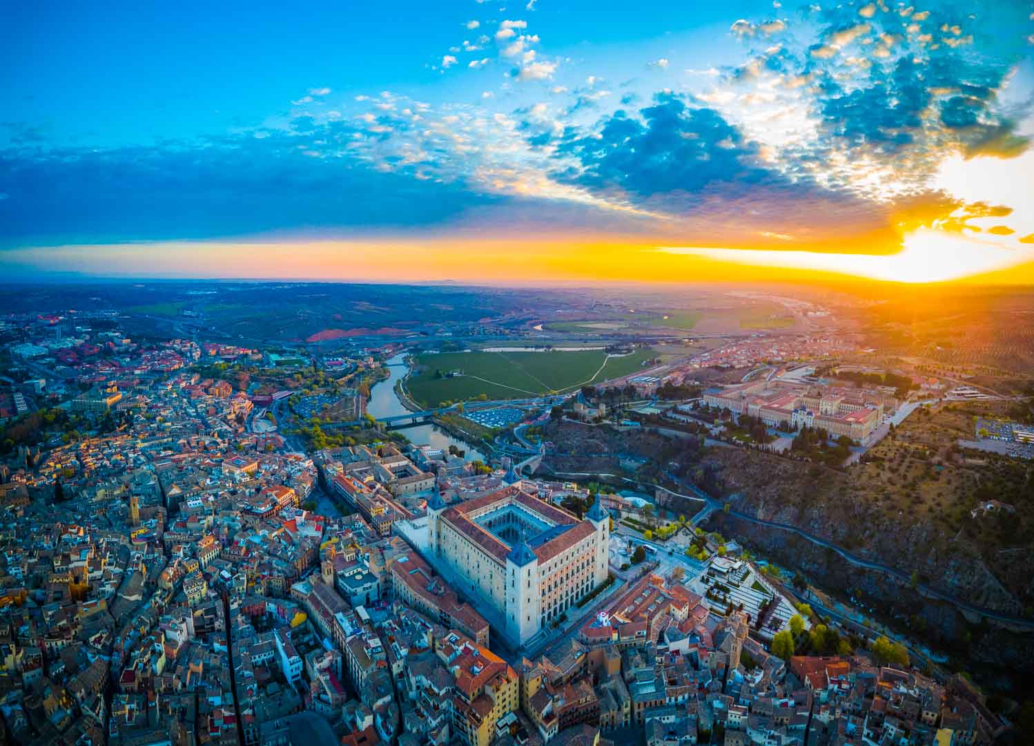 magnificent sunrise over the alcazar de toledo