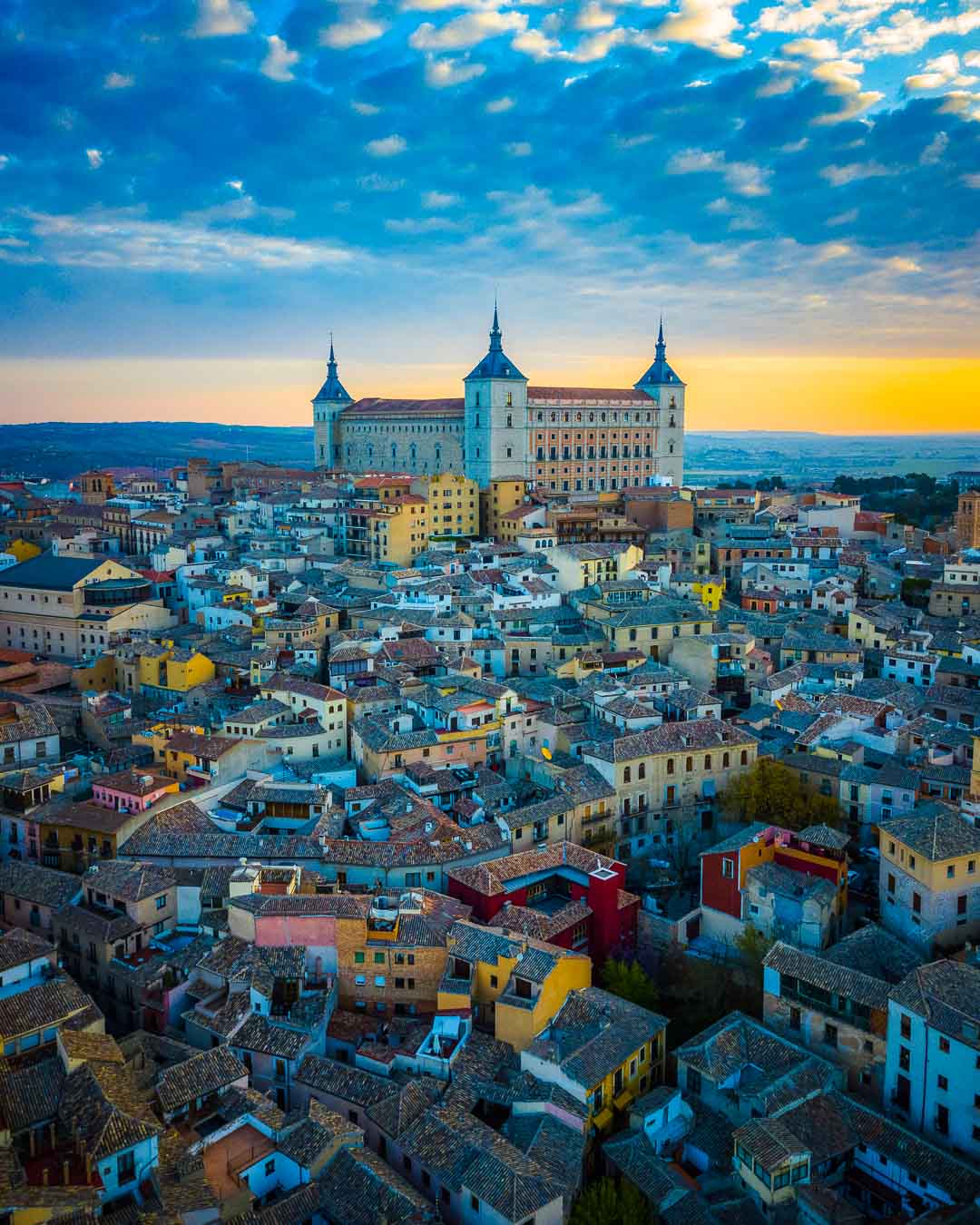 houses leading up to the castle in toledo spain