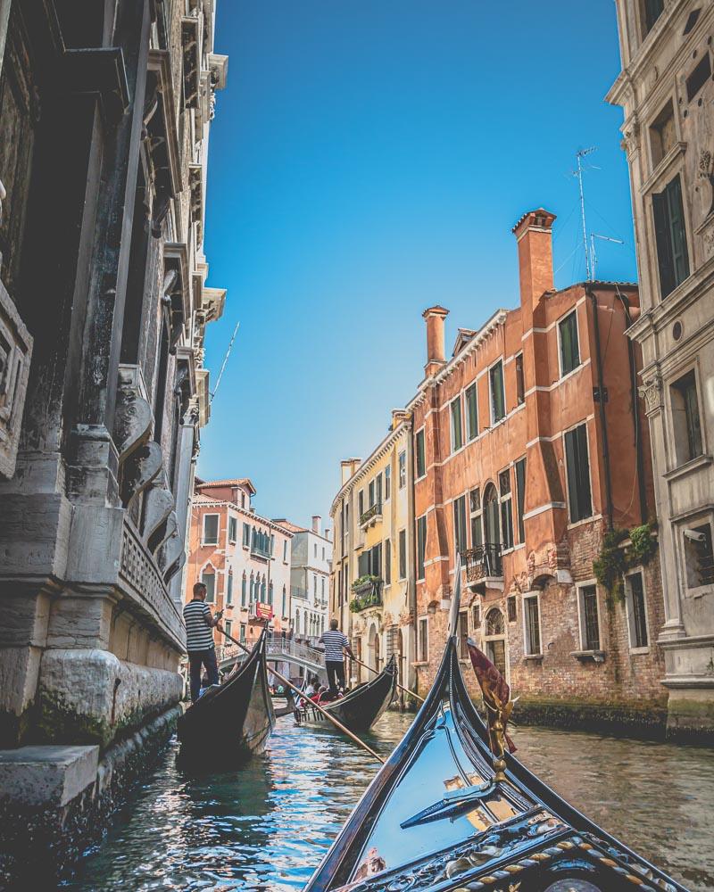 first person view from a gondola in venice italy