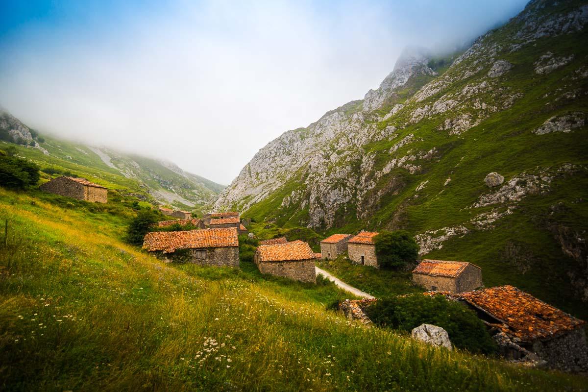 the abandoned stone huts below sotres