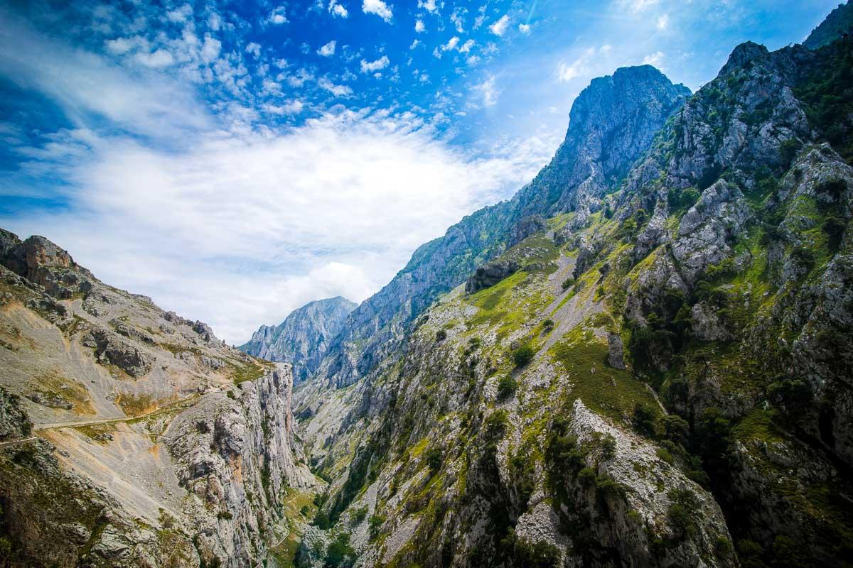 the vast landscape with the tiny path on the left