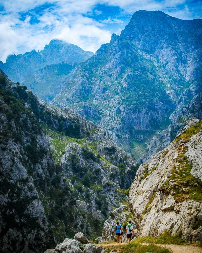 putting the size of the mountains in perspective with hikers