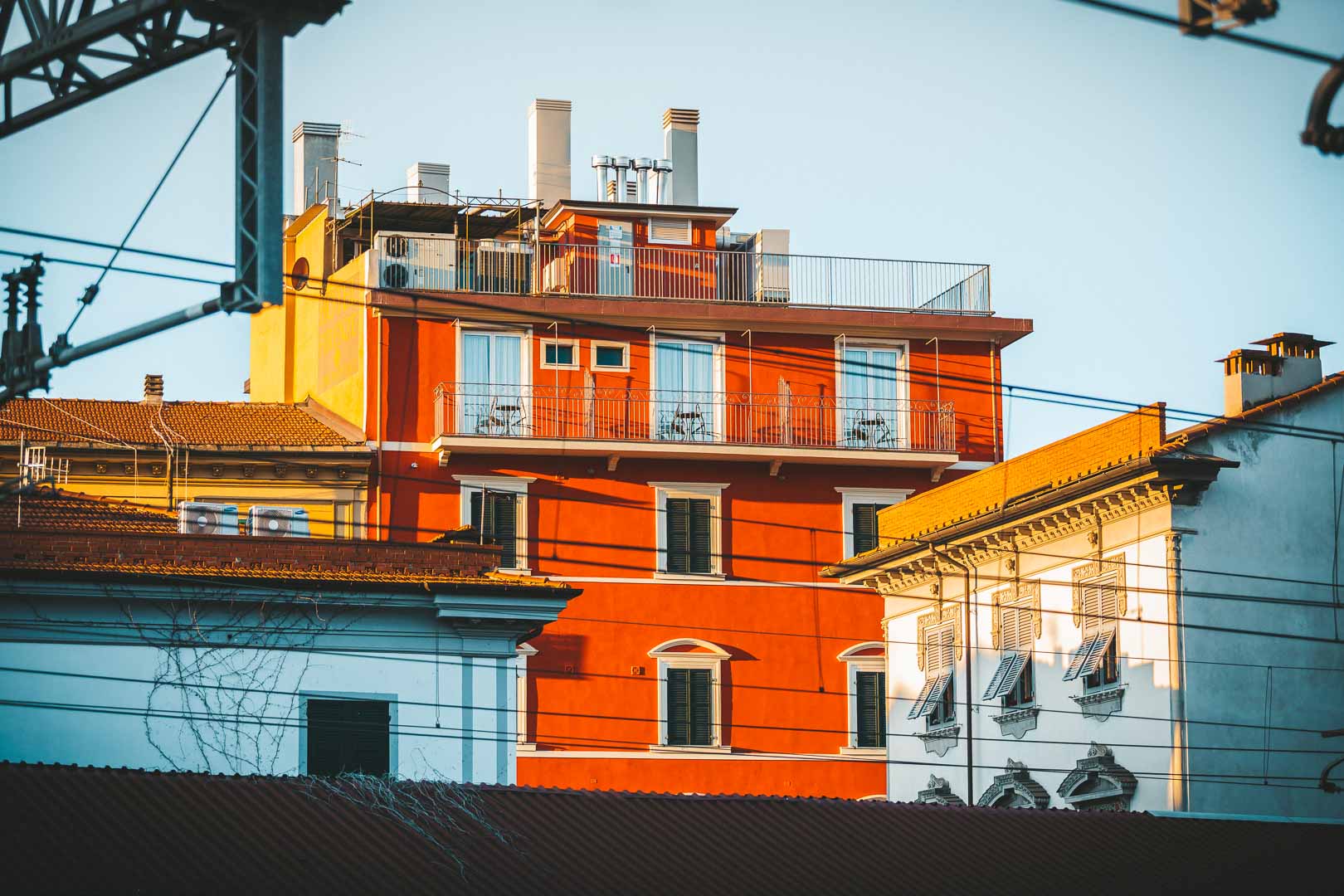 view of a red building from la spezia station