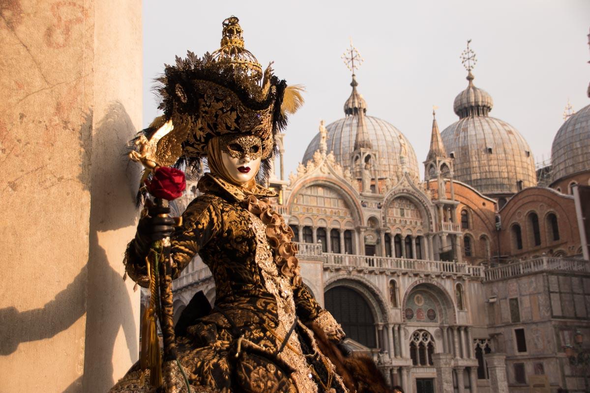 lady in costume and a mask during the venice carnival