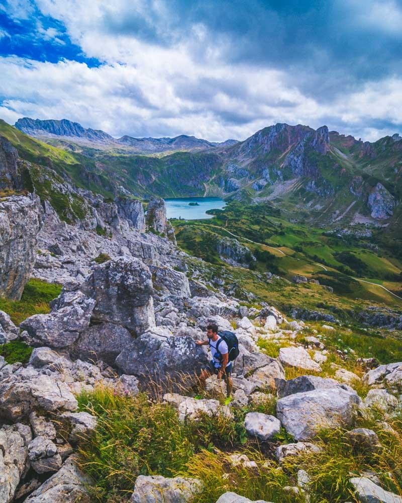 climbing on big rocks near the lago del valle somiedo spain