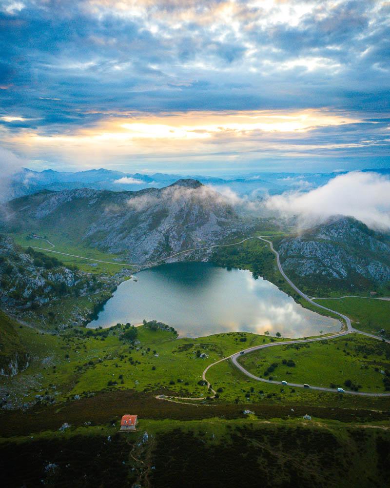 sun setting above the lago de covadonga