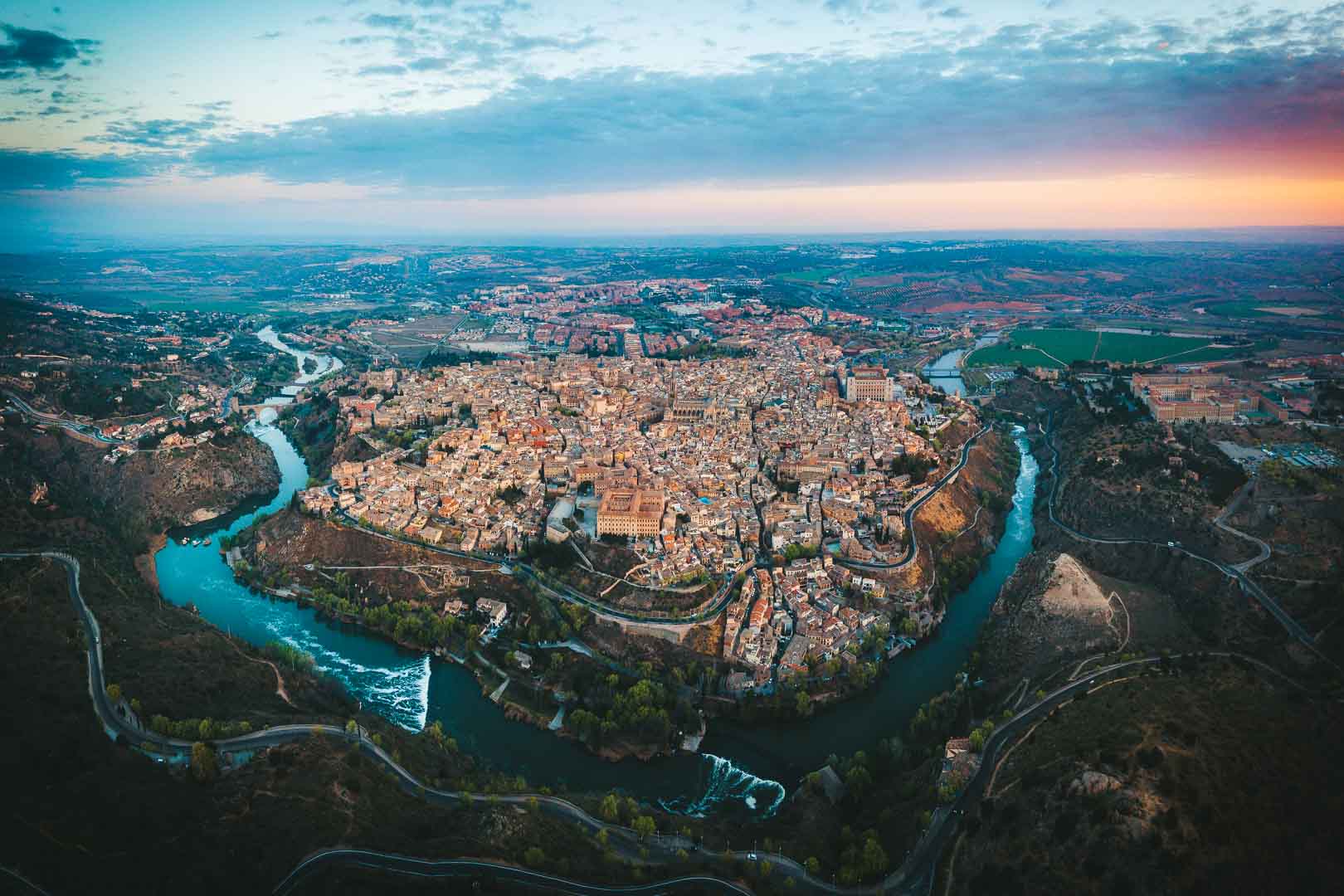 the whole city of toledo at sunrise from above the mirador del valle toledo