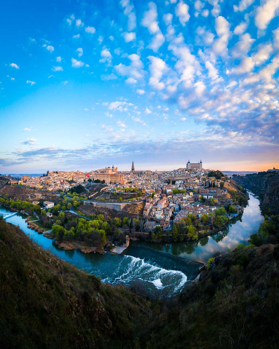 take the train madrid to toledo and enjoy this view over the city from the mirador del valle