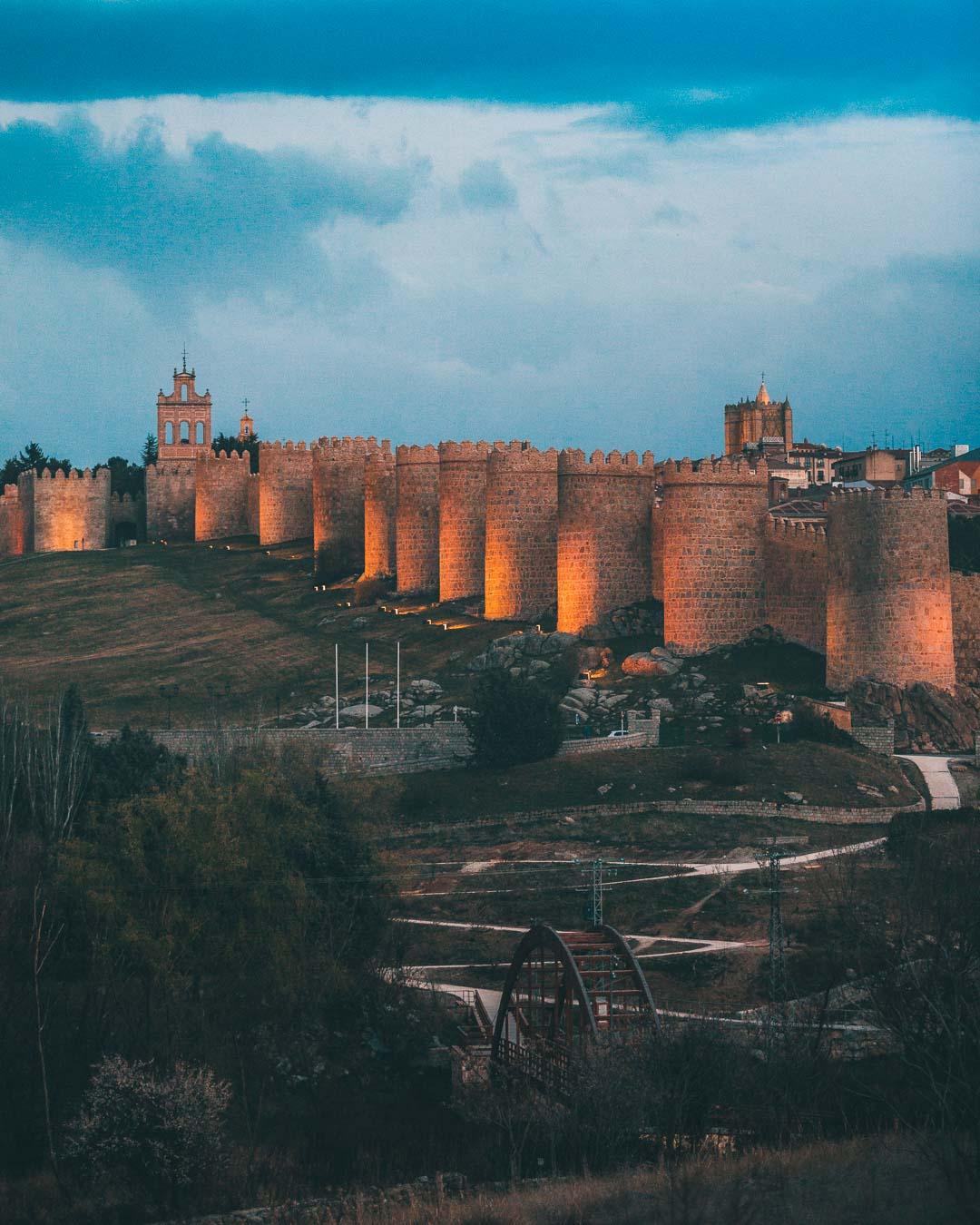 view of the muralla de avila just before night