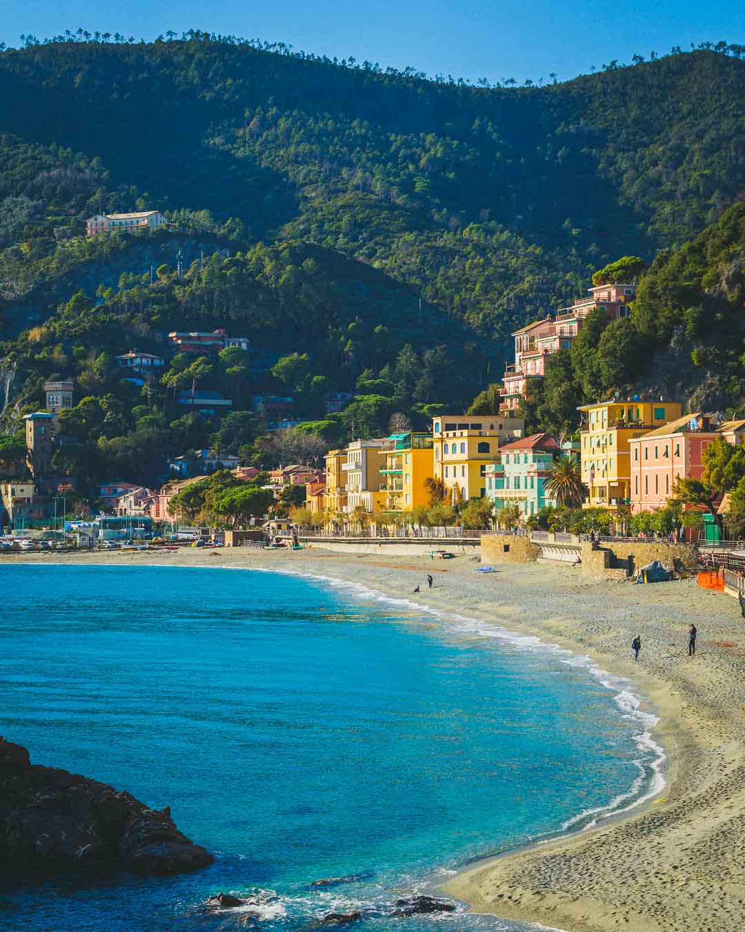 beautiful sand beach filled with hotels in monterosso cinque terre