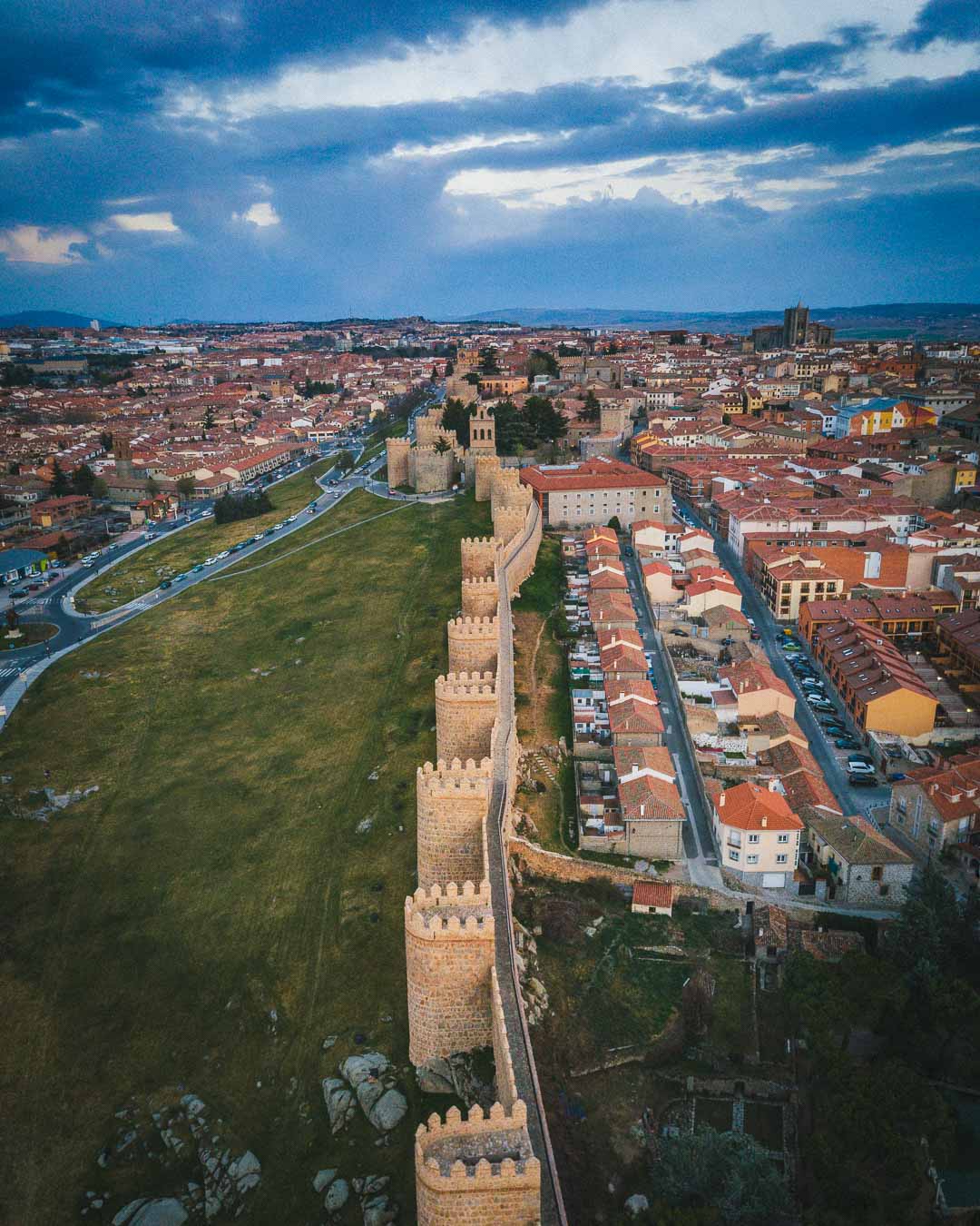 aerial view over the fortified walls of avila spain