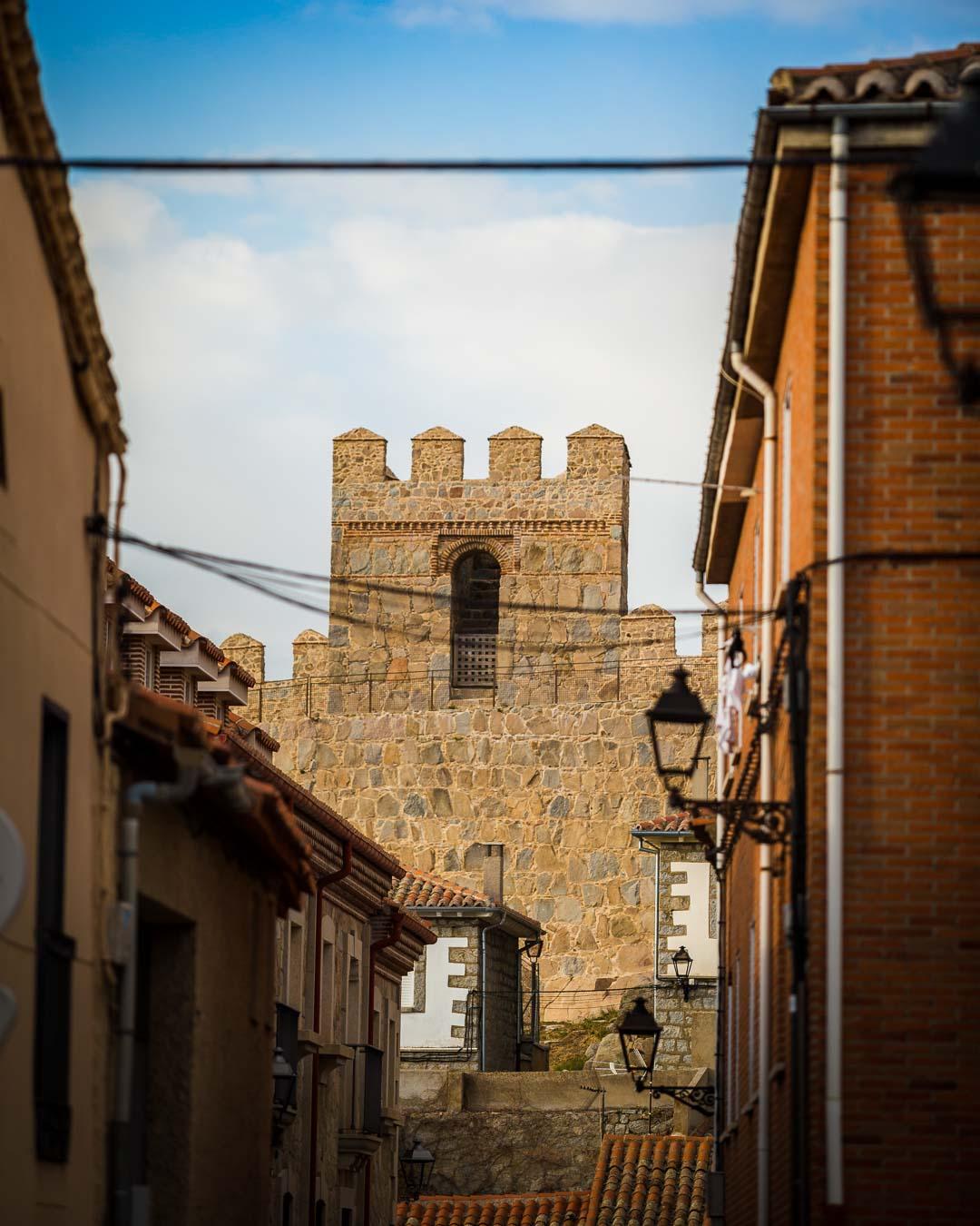 tower of the avila muralla from a street