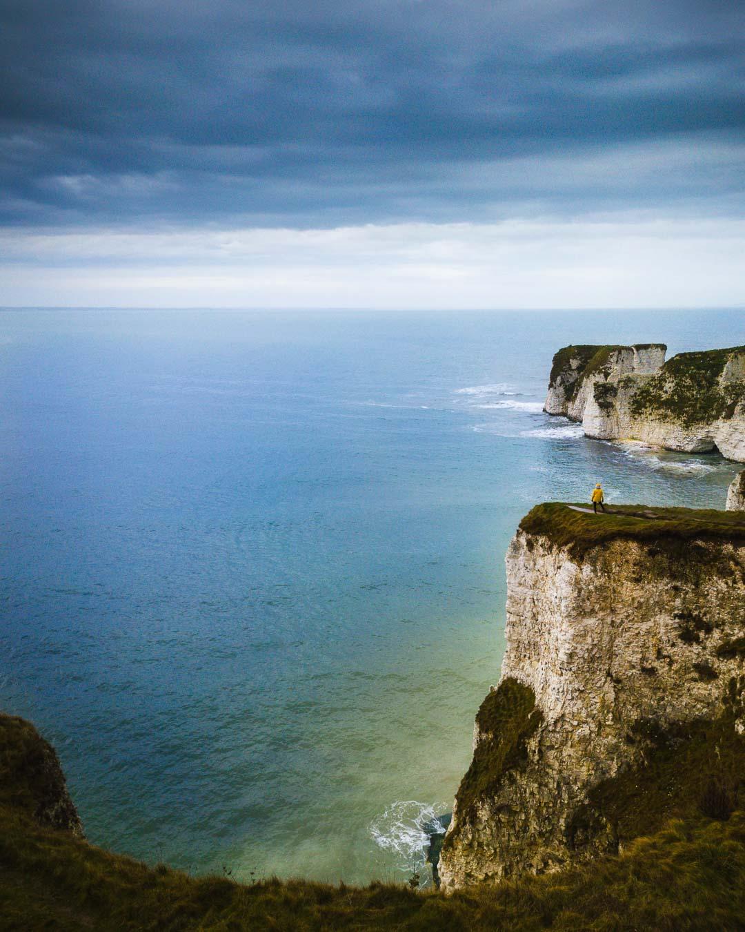 standing on cliff at old harry rocks