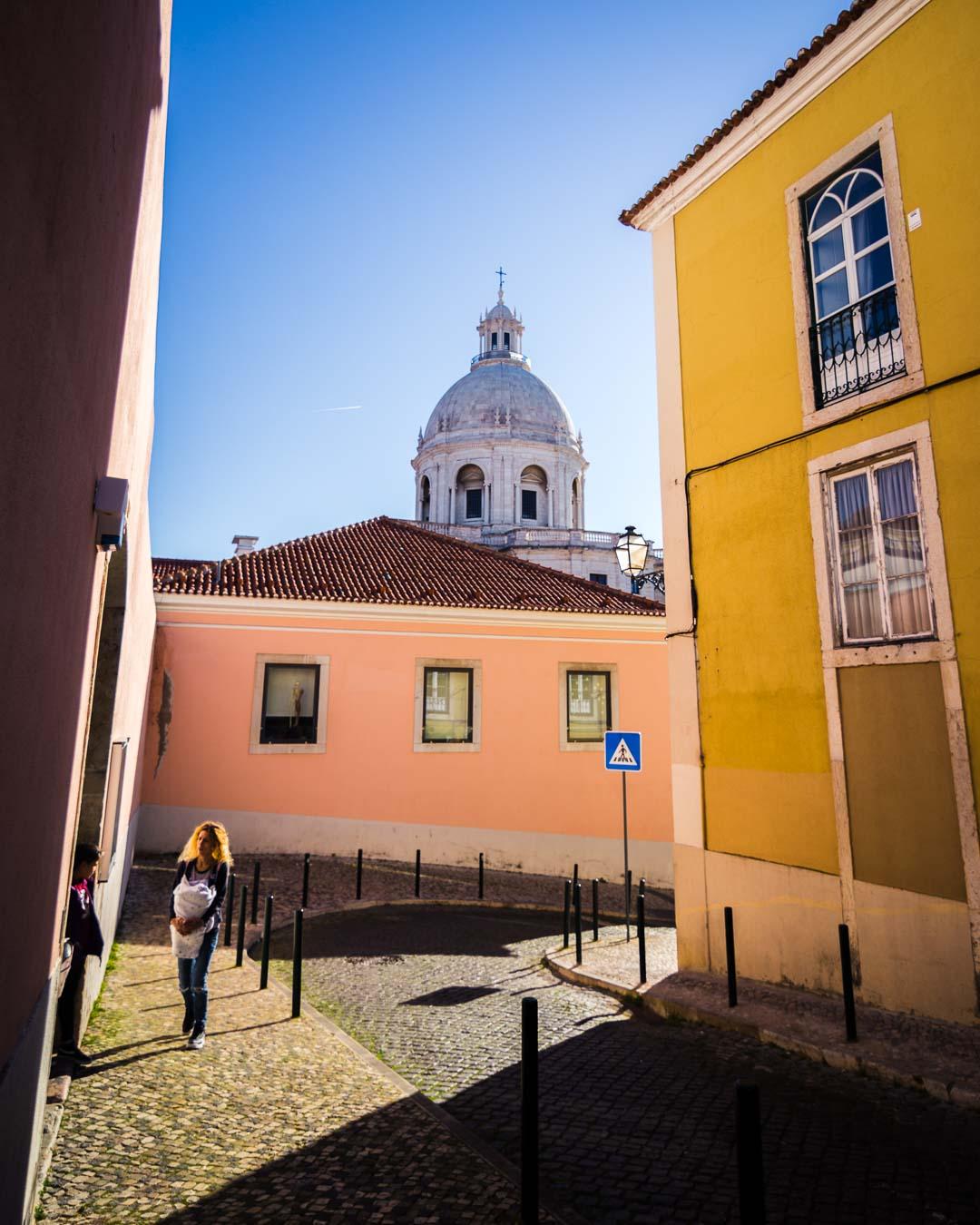 the white dome of the panteao nacional above the buildings of alfama