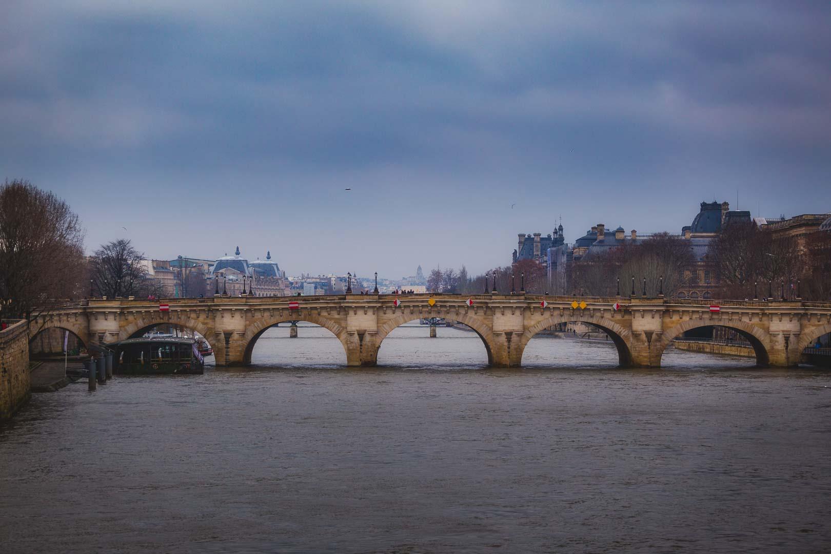 pont neuf paris in moody weather