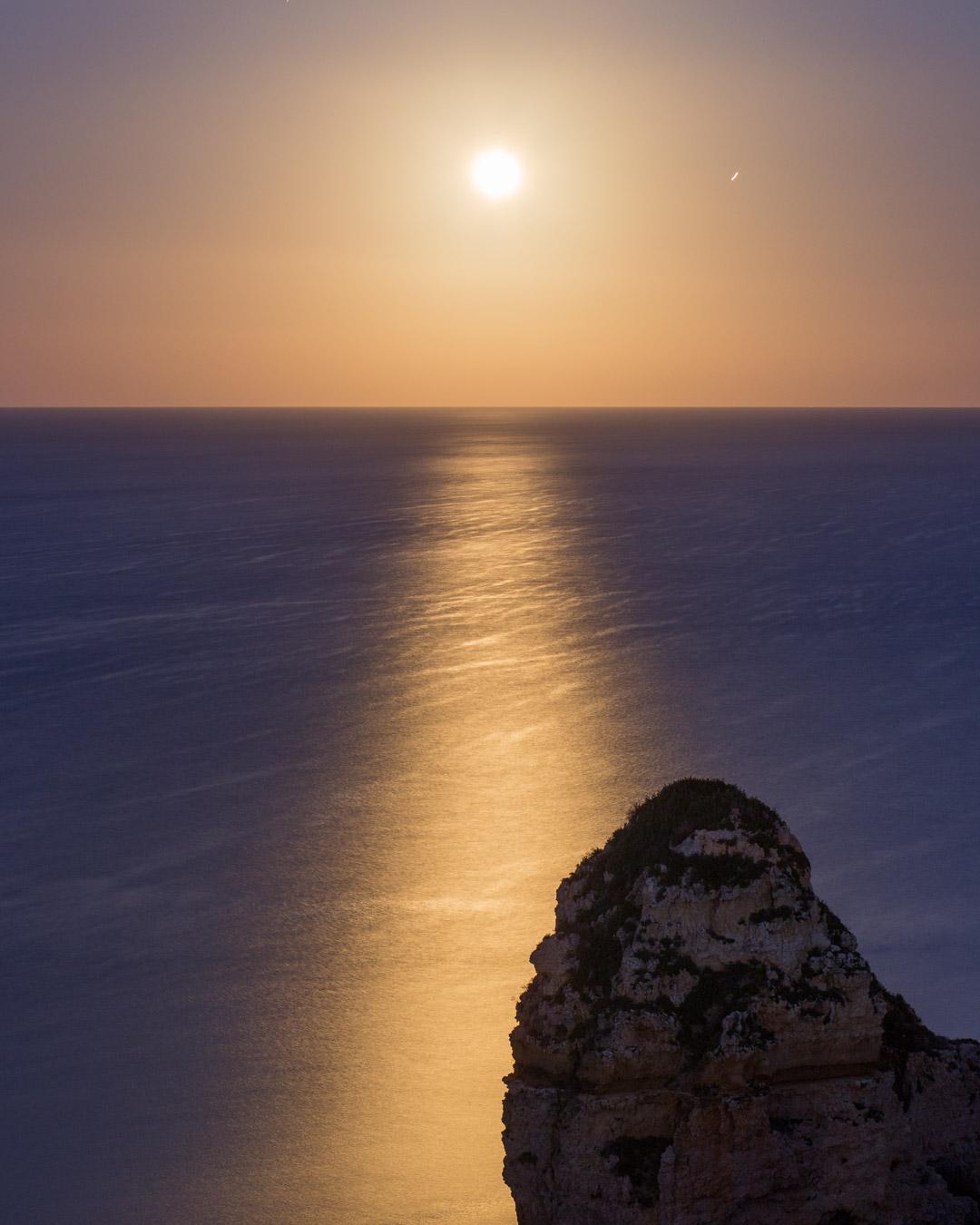 red moon over the sea