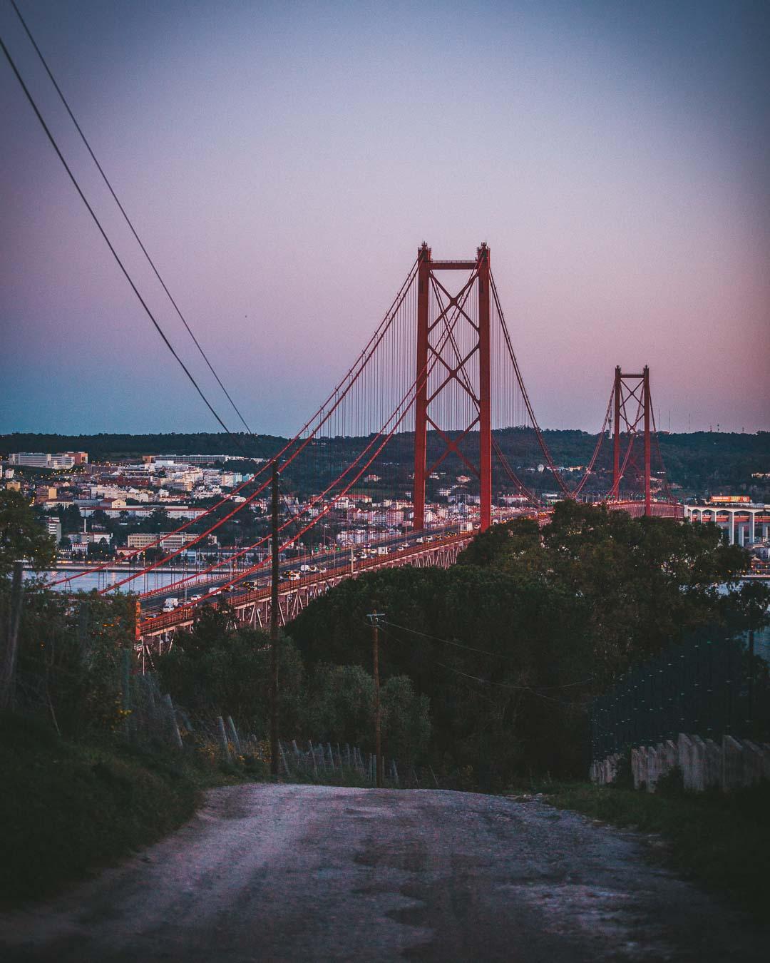 view over the 25 de abril bridge next to the cristo rei