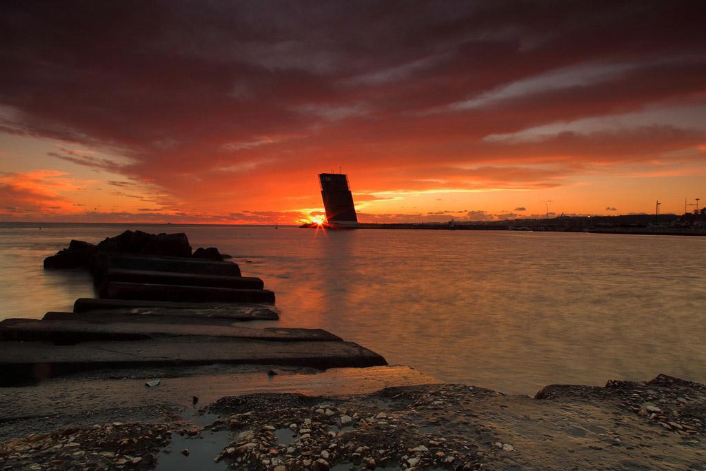 praia de alges at sunset lisbon