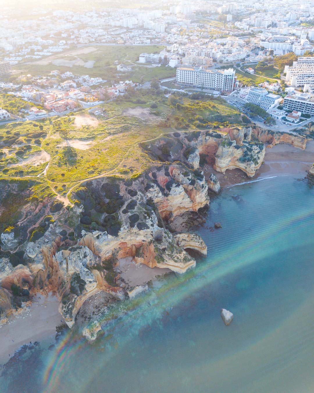 the cliffs of praia do camilo from above