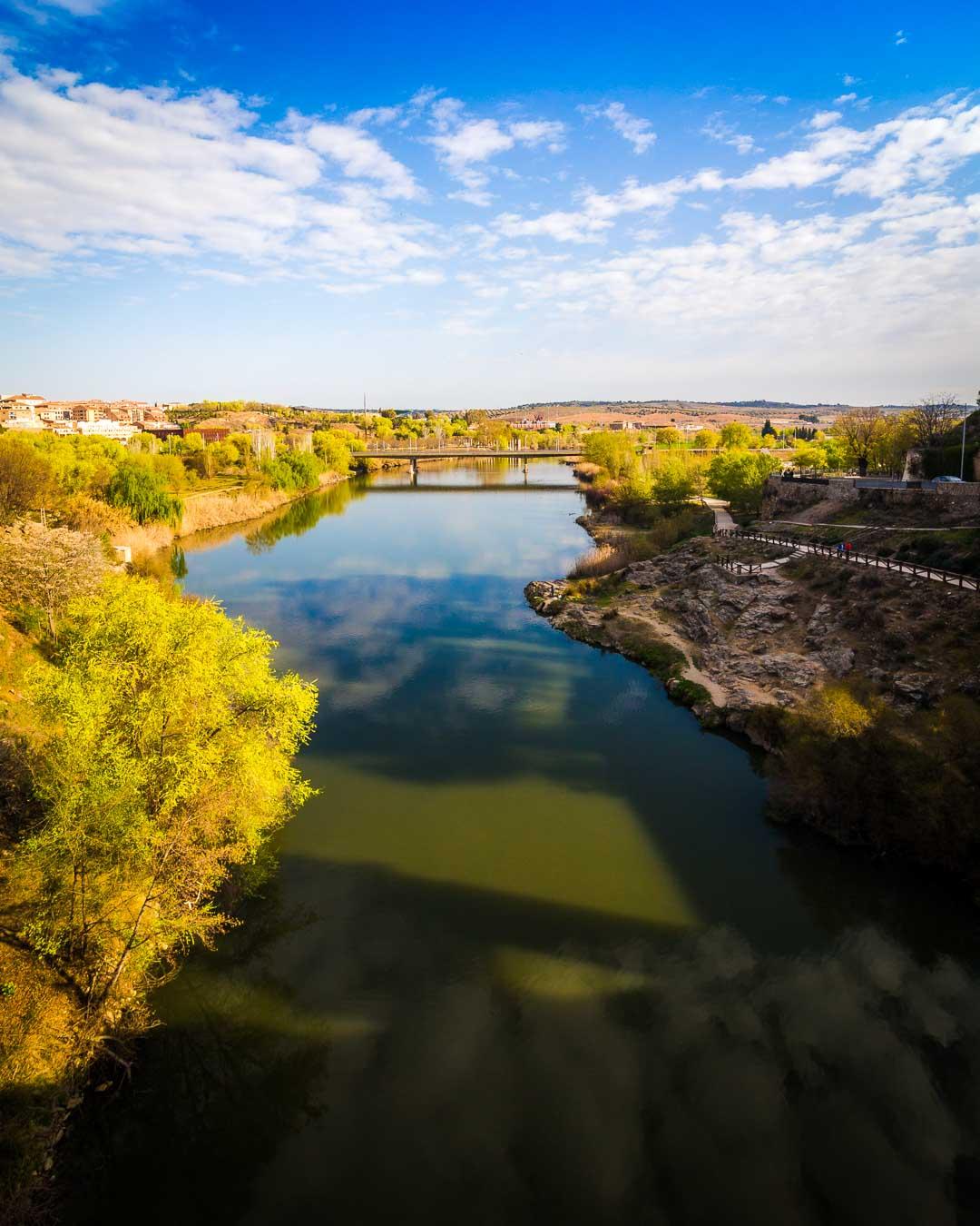 view over the tajo river north from the puente de alcantara