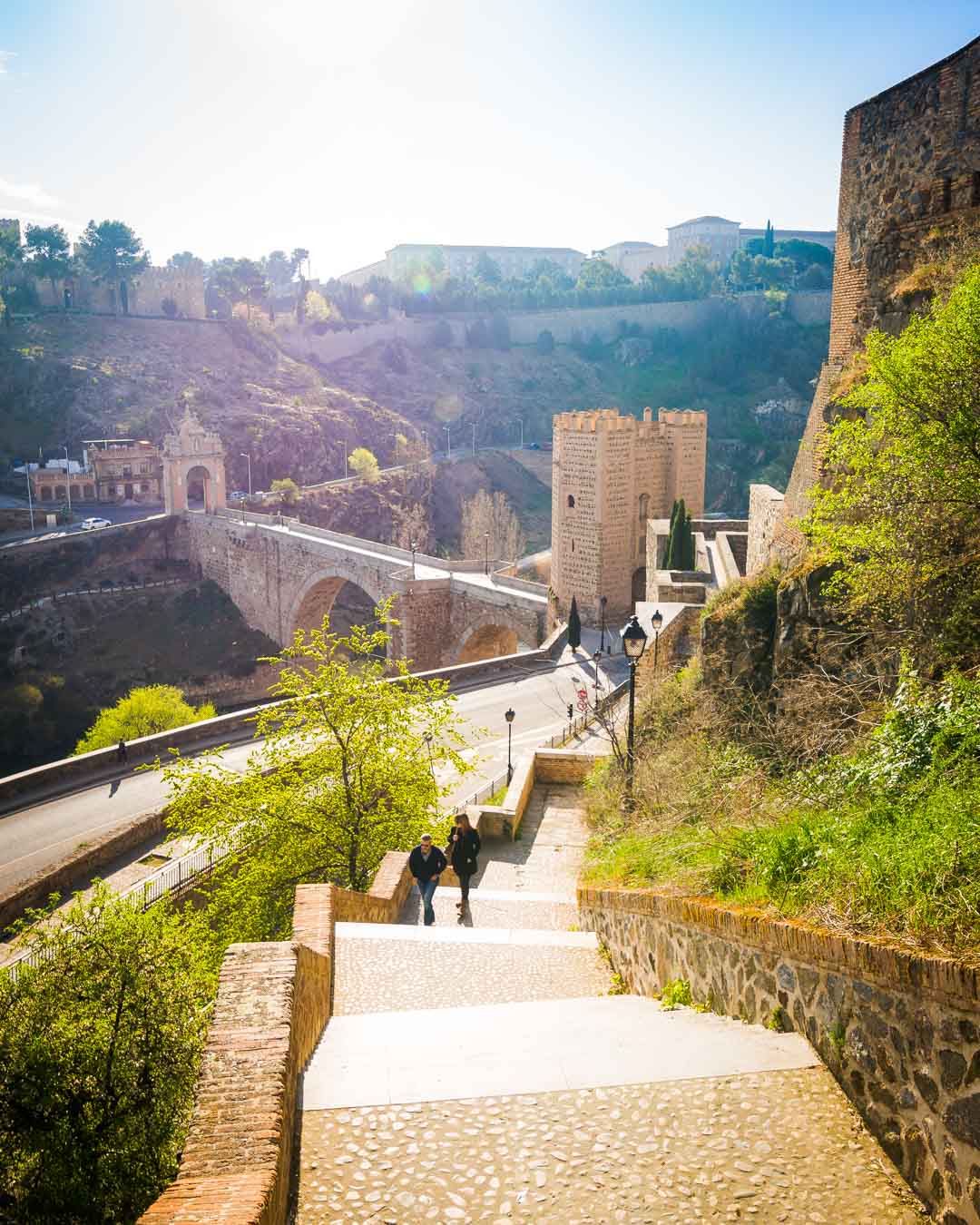 stairs from the puente de alcantara leading up to the paseo del miradero toledo