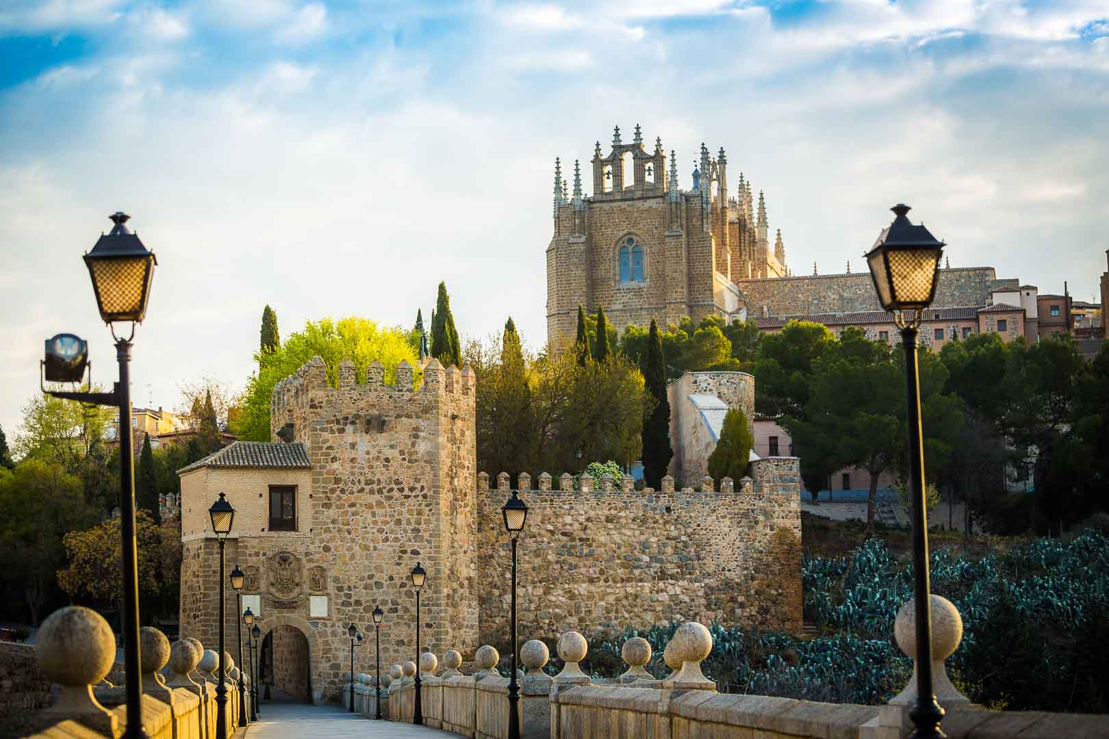 puente san martin toledo with the monastery san juan de los reyes in the back