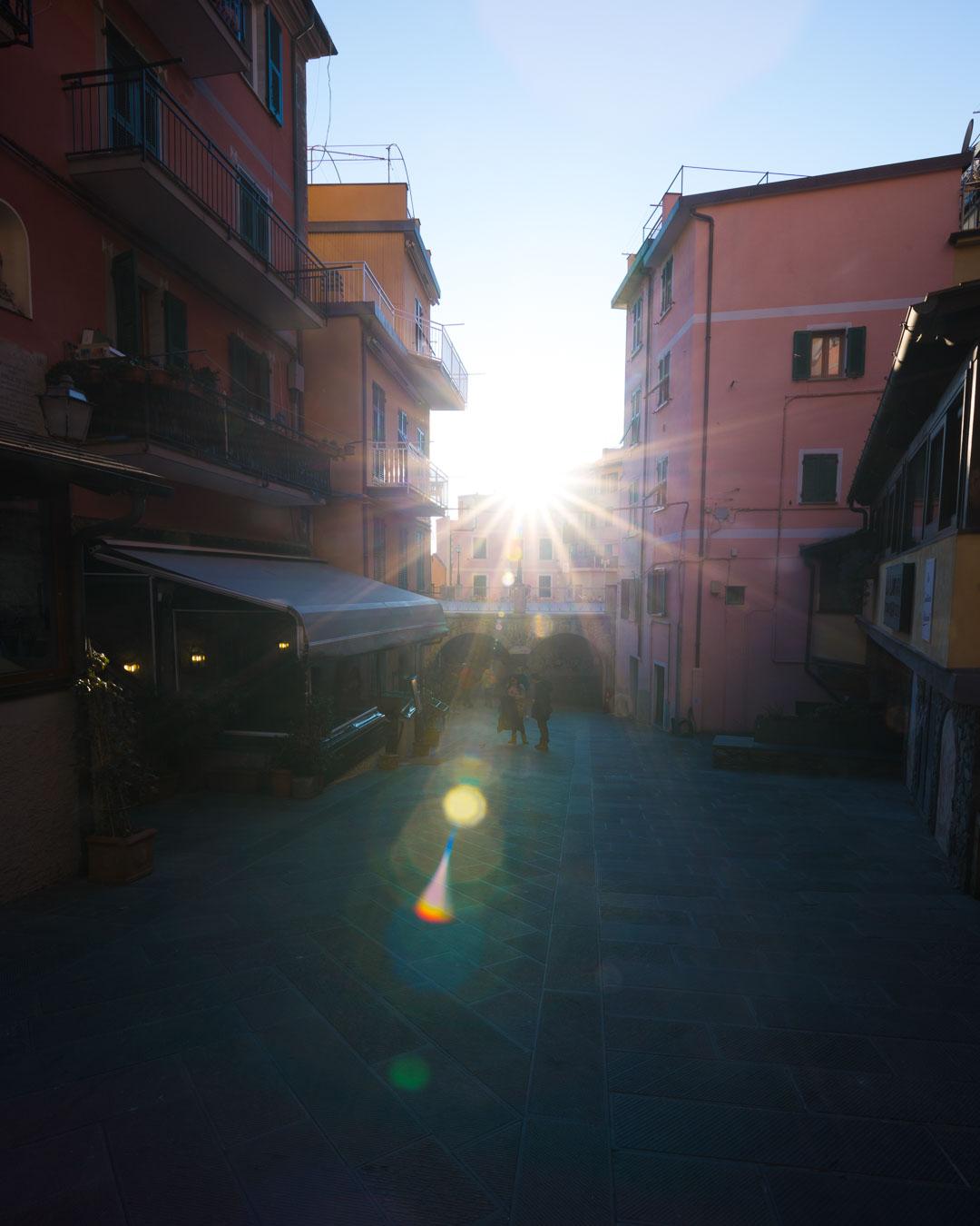 sunset over the streets of riomaggiore