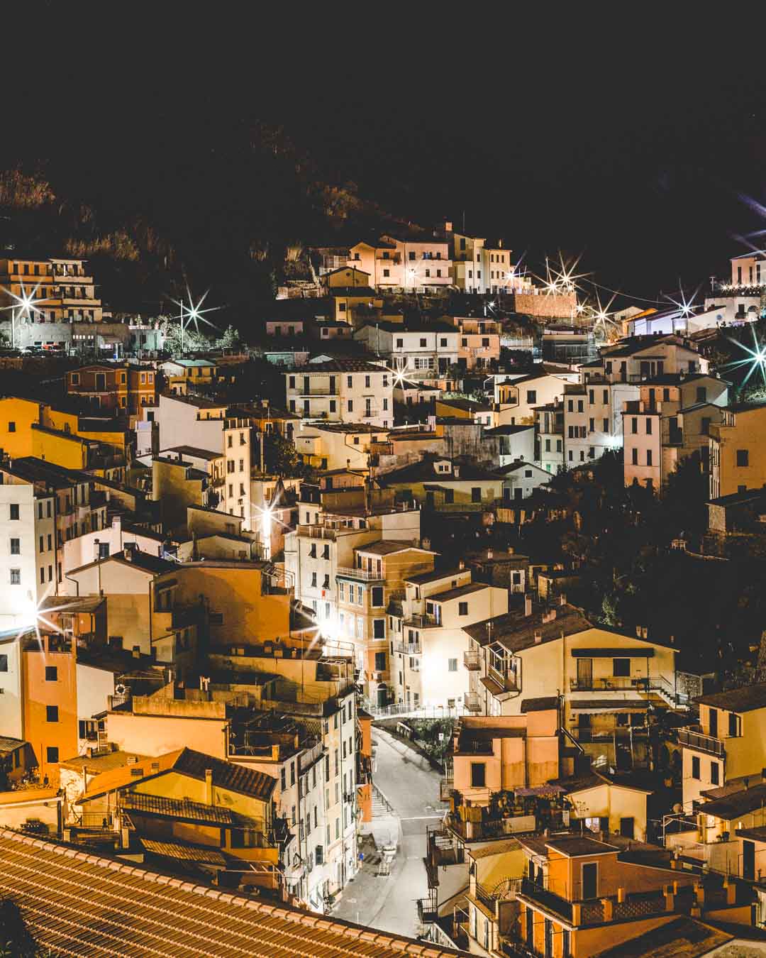 streets of riomaggiore cinque terre with city lights