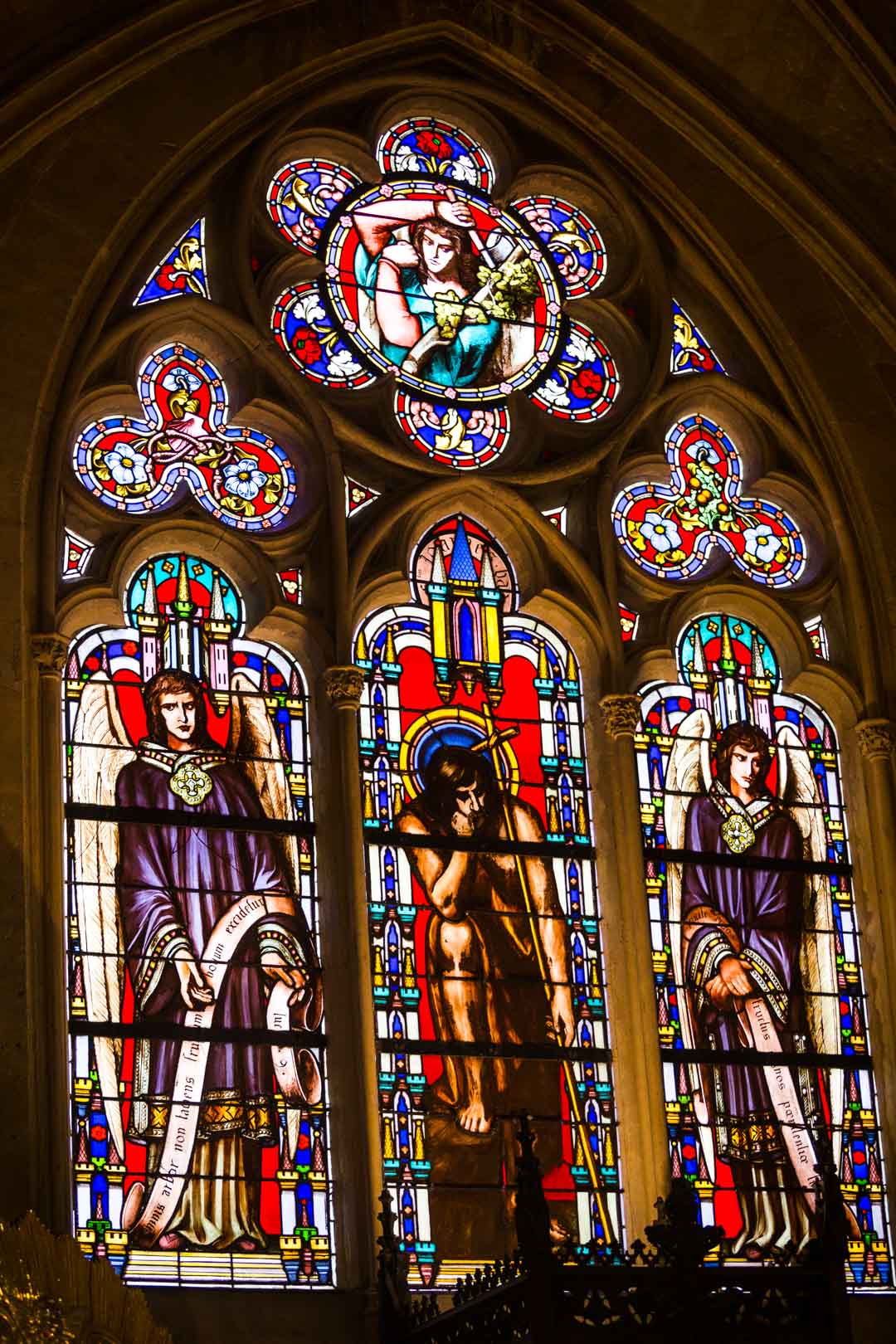 the beautiful stained glass window of the church saint germain l'auxerrois paris