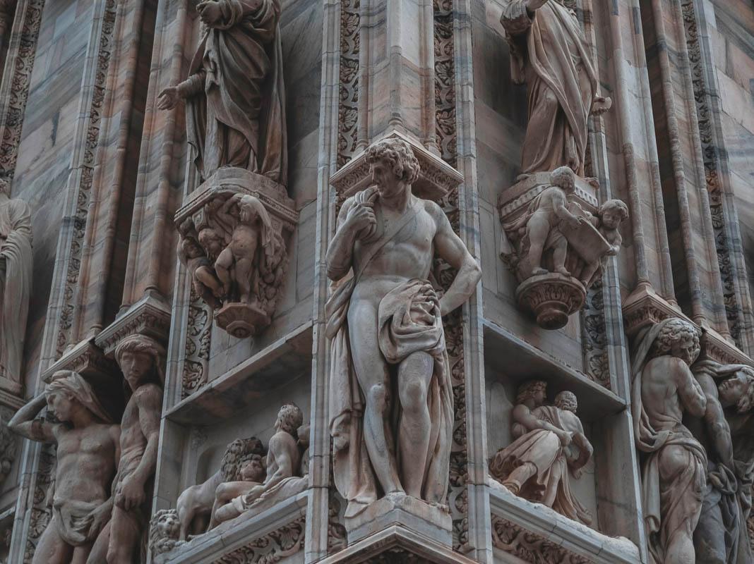 statues on the facade of the milan cathedral