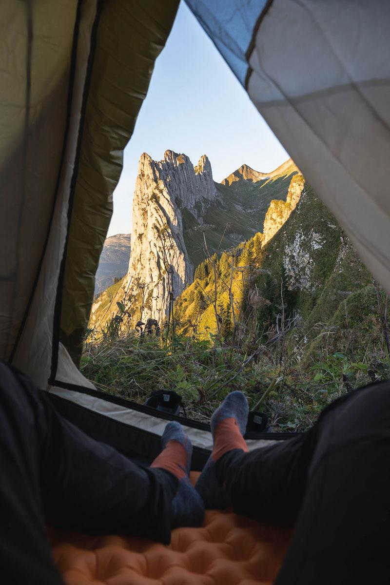 sunrise over the mountain as seen from a tall 4 man tent