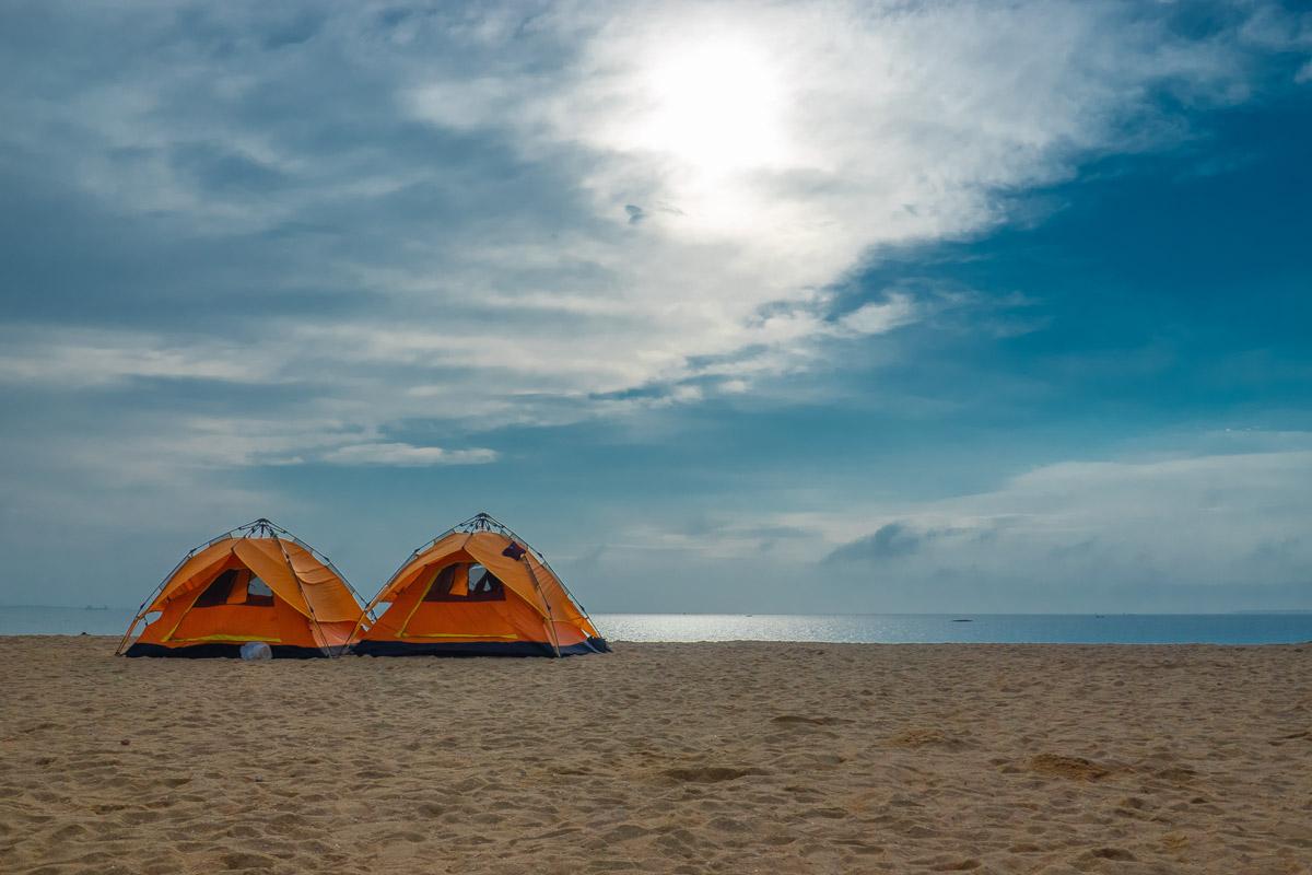 two 6 man pop up tents on the beach