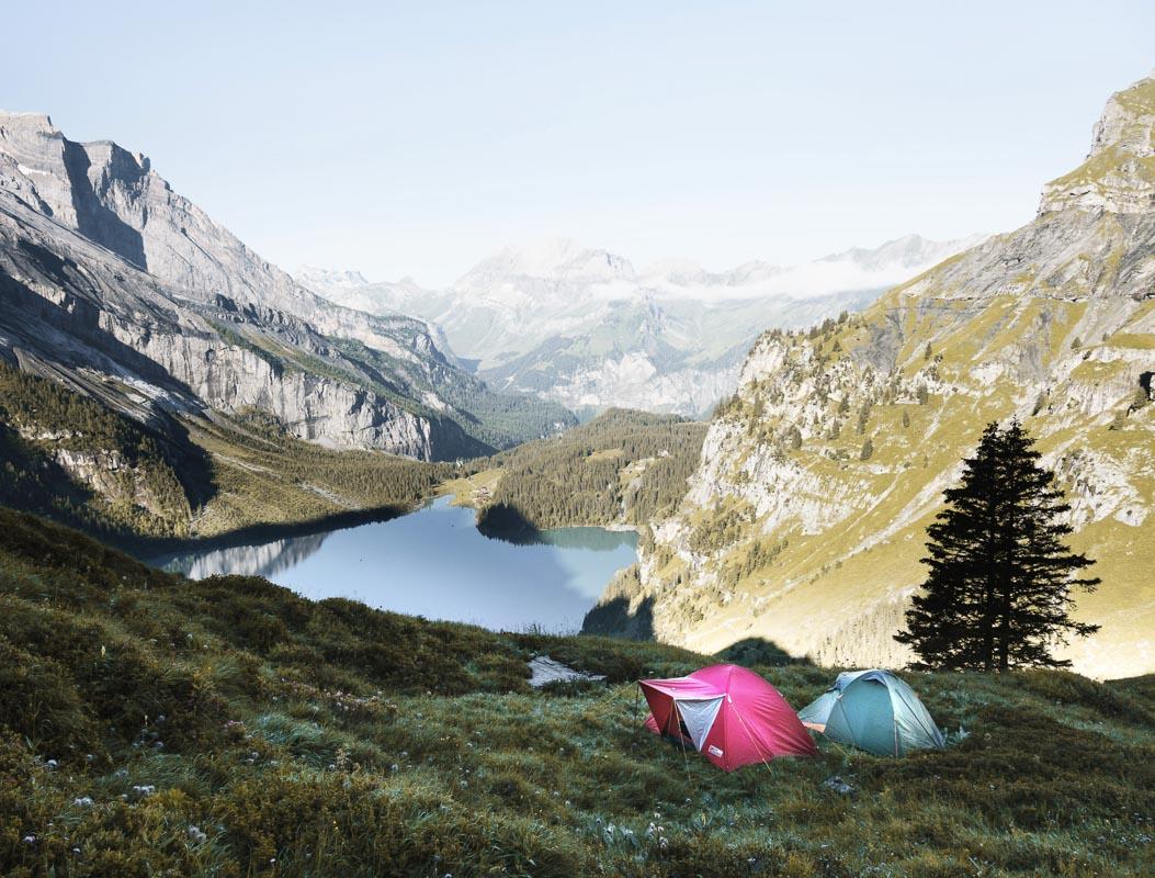 two 6 person inflatable tents in the outdoors