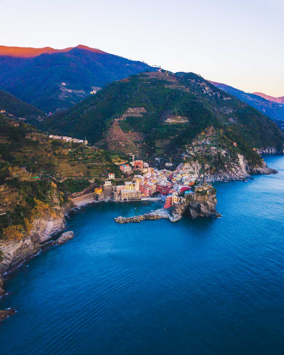 sunset over the mountains of vernazza