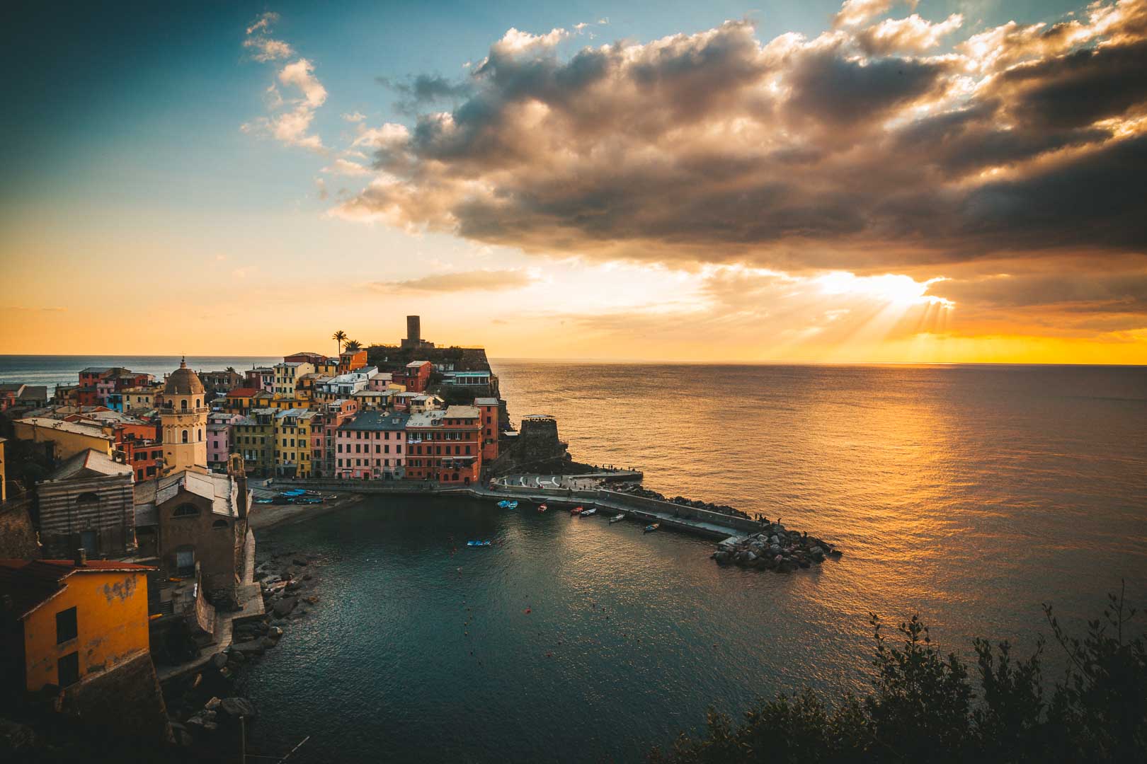 xatching the sun set from a vernazza boat tour