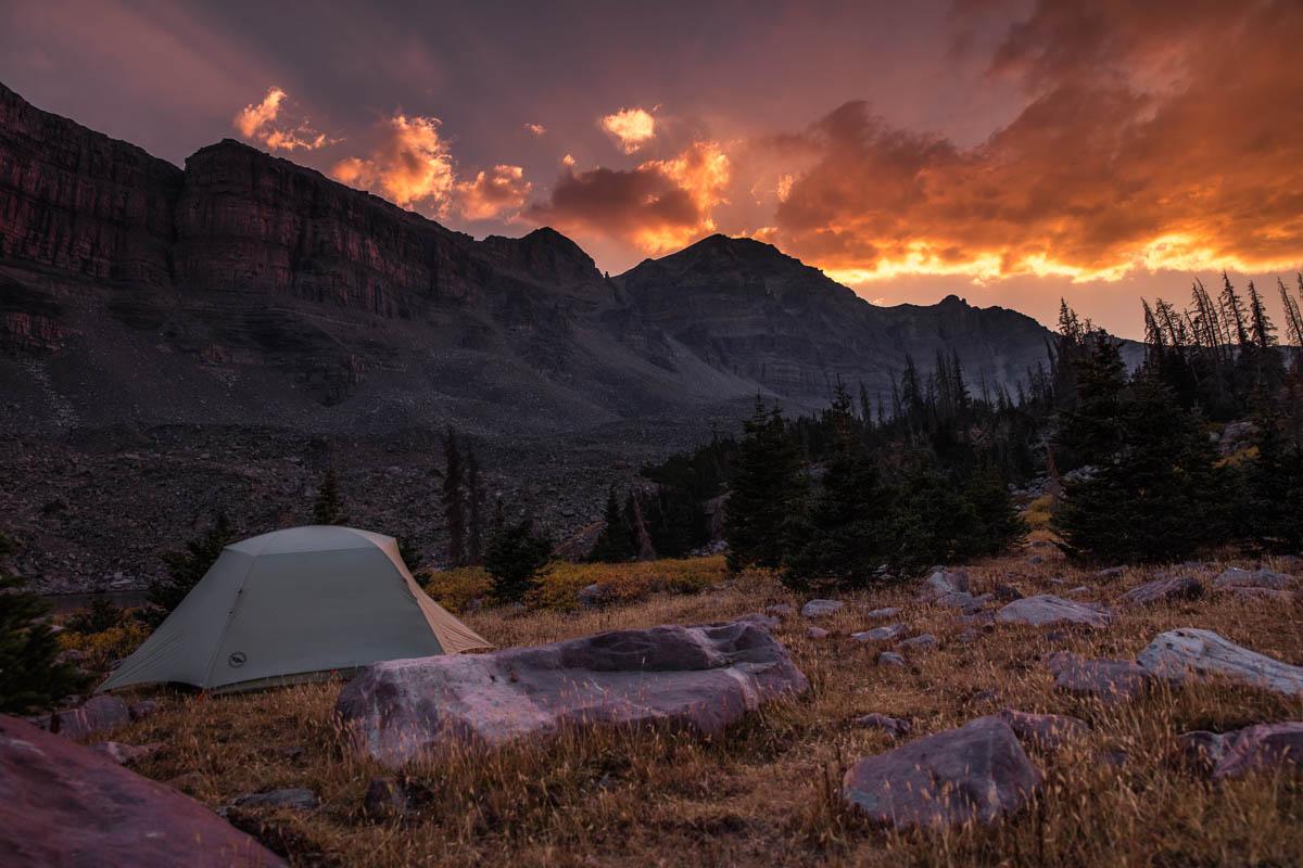 watching the sunset from a white 4 man inflatable tent