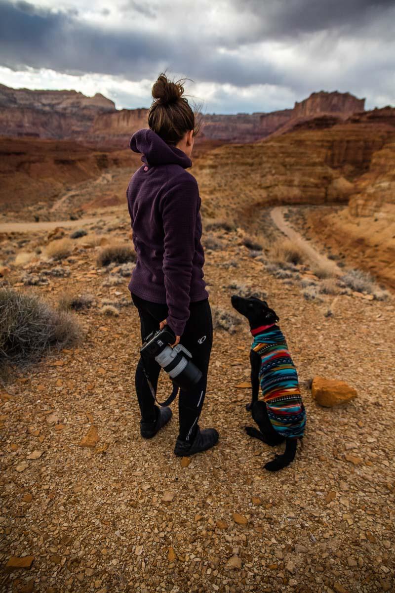 woman photographer and her dog in the outdoors