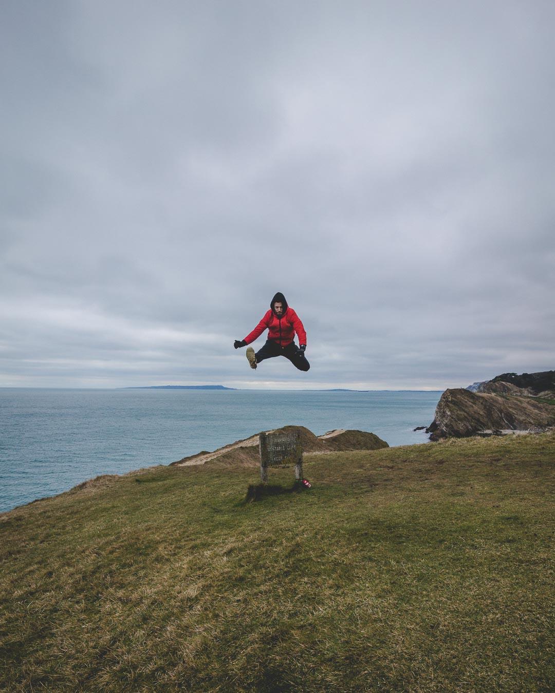 jumping on top of lulworth cove