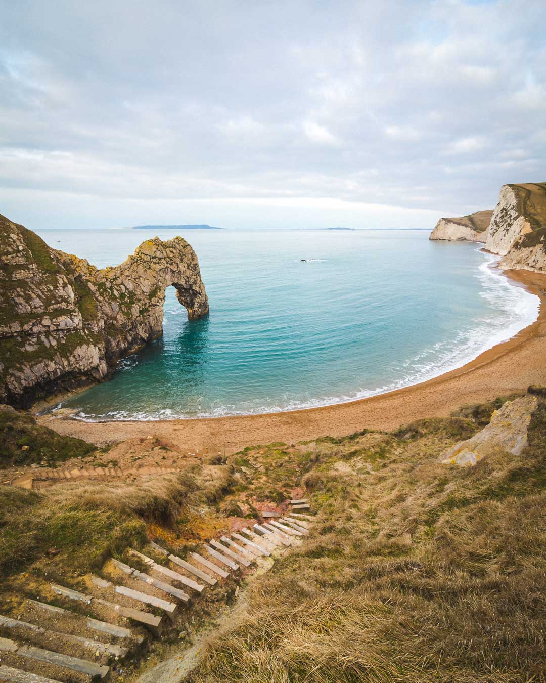 early morning in durdle door with no one around
