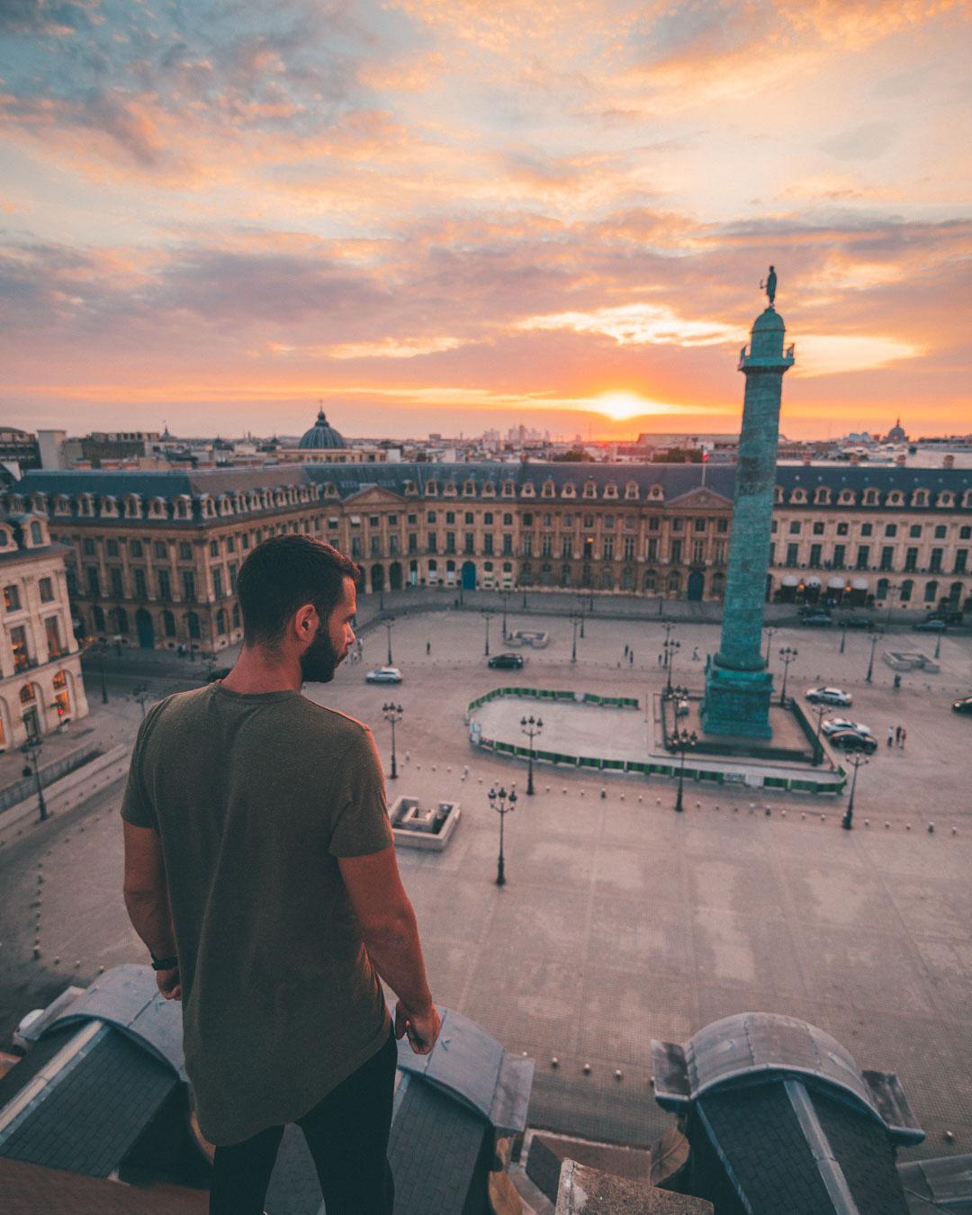 robin watching the sunset over place vendome