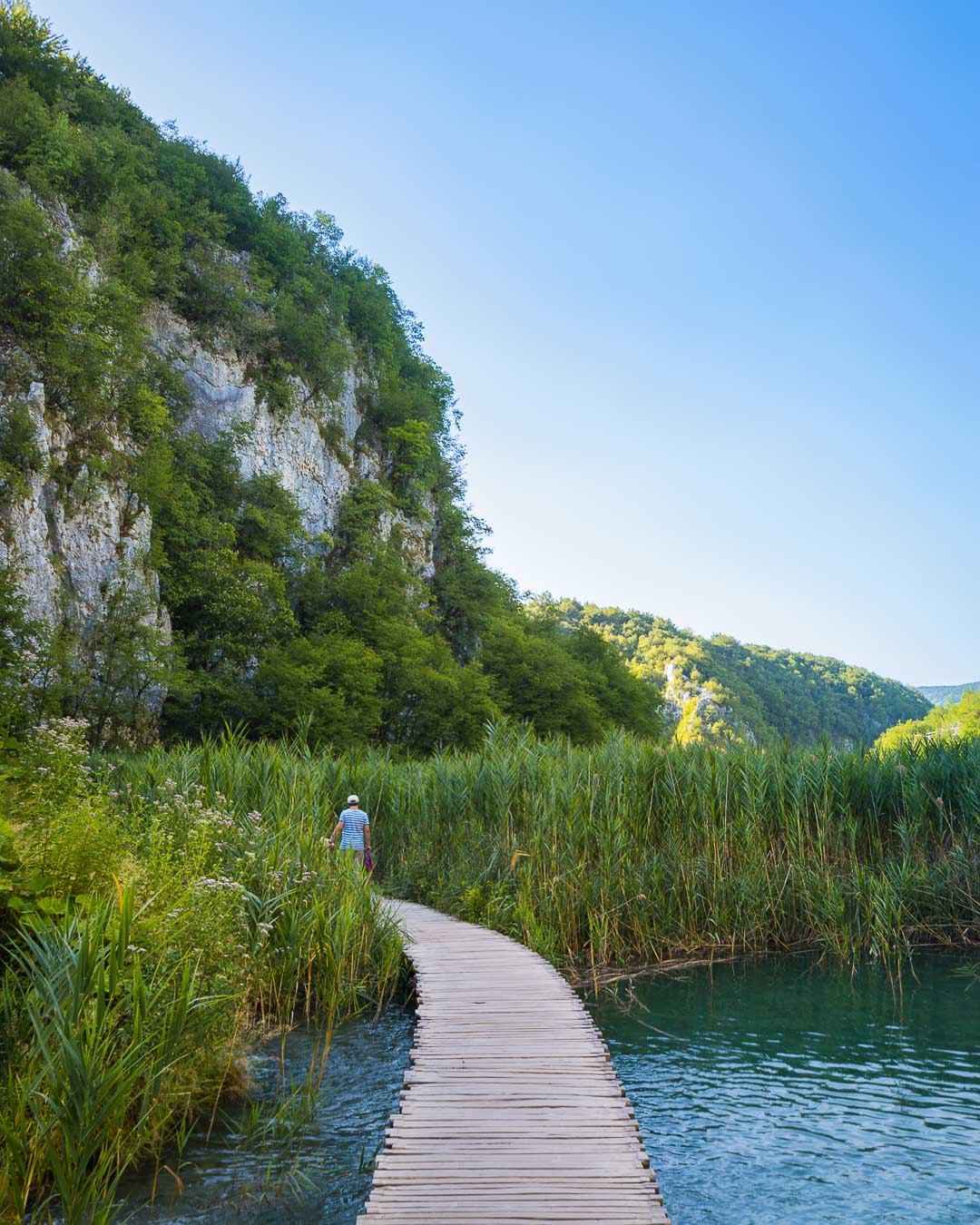 stranger walking in plitvice