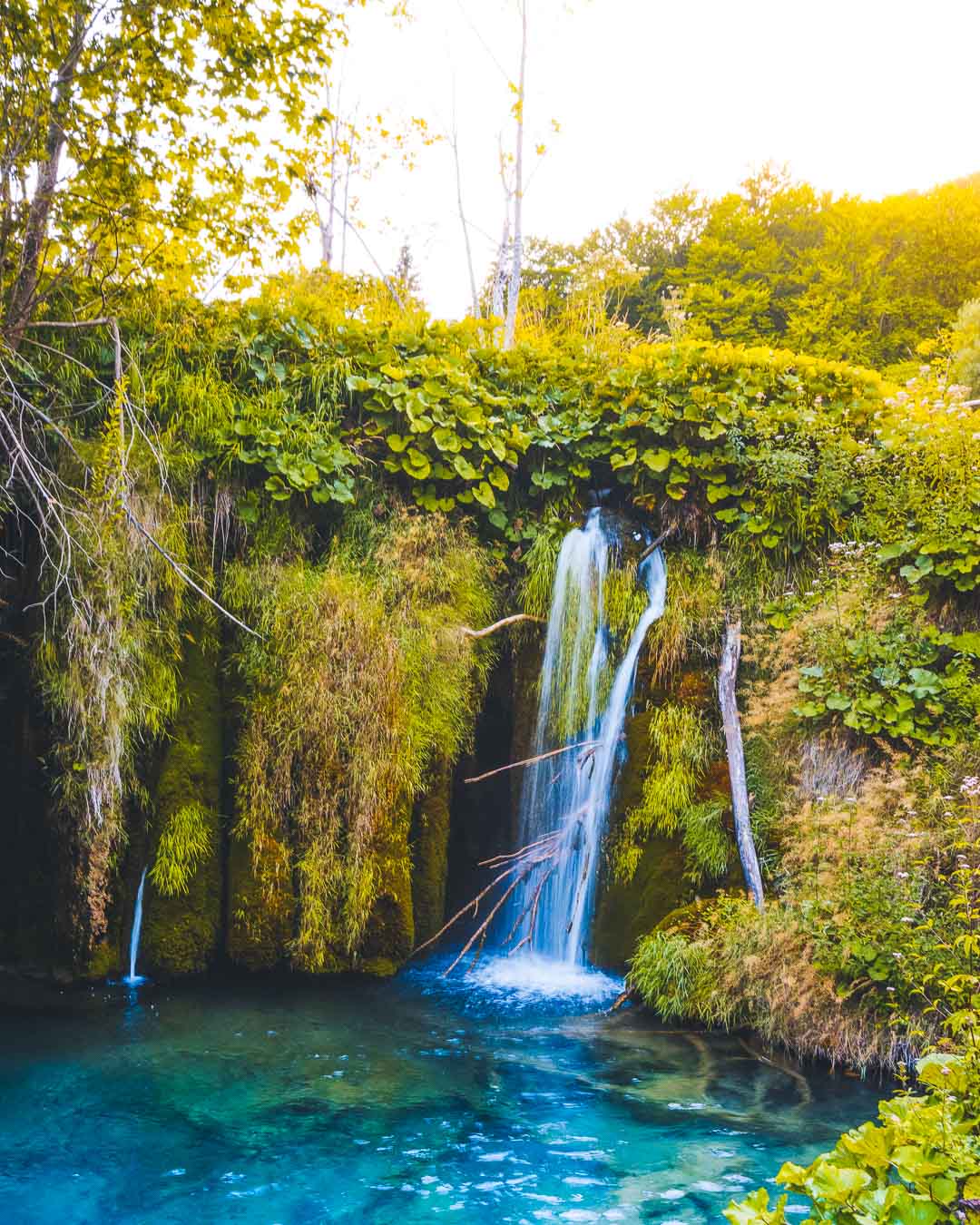 clear blue waterfall in plitvice