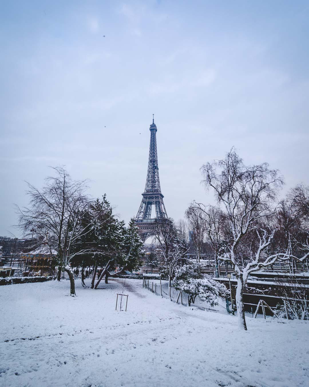 eiffel tower under snow paris in winter