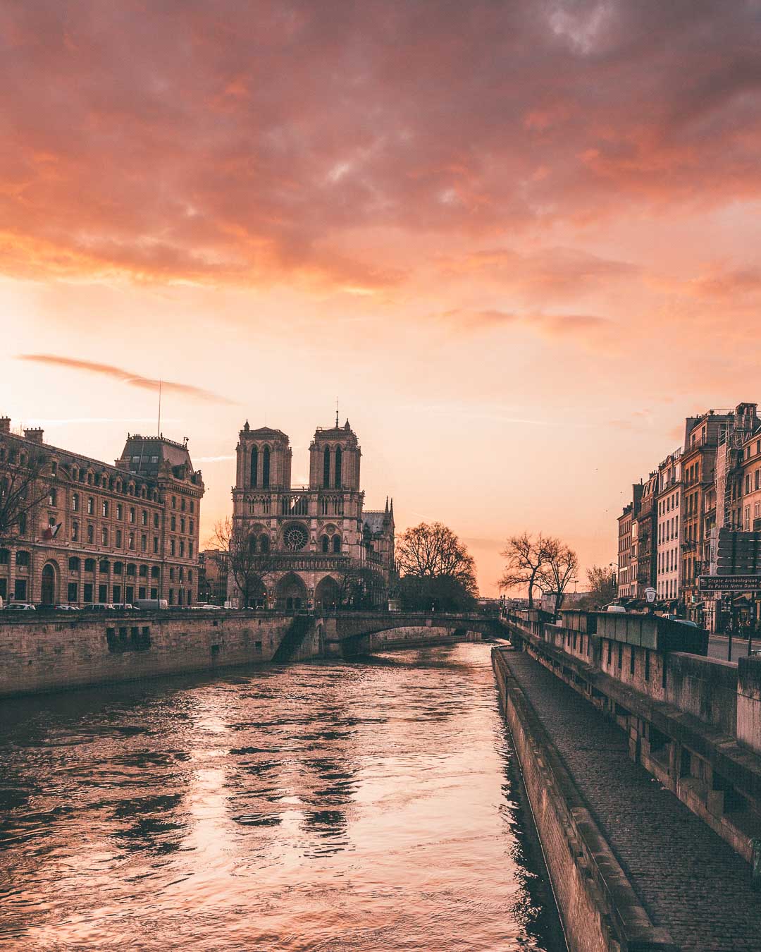 sunset over notre dame de paris